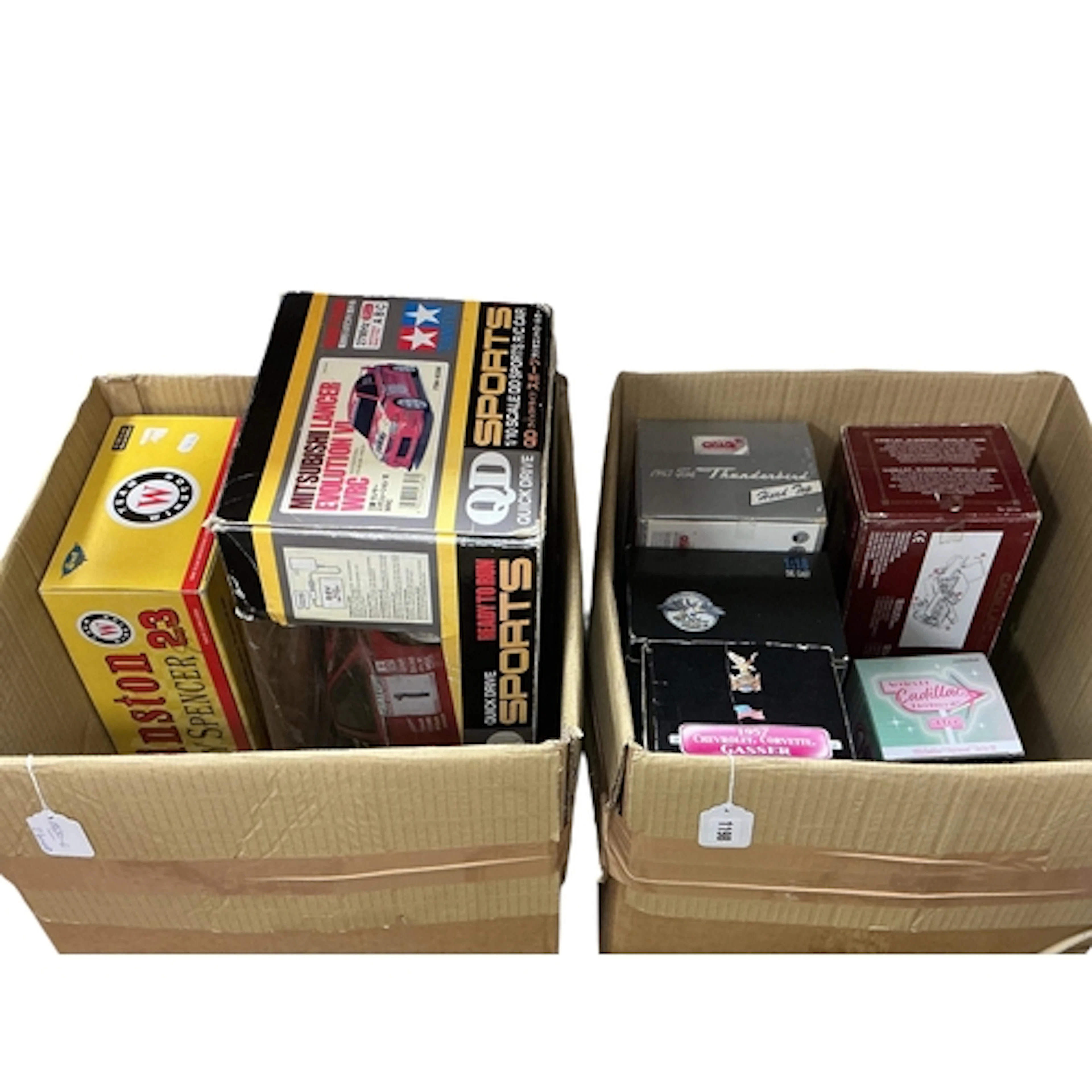 Nine boxed larger scale (1:10, 1:18 and 1:24) diecast cars b...