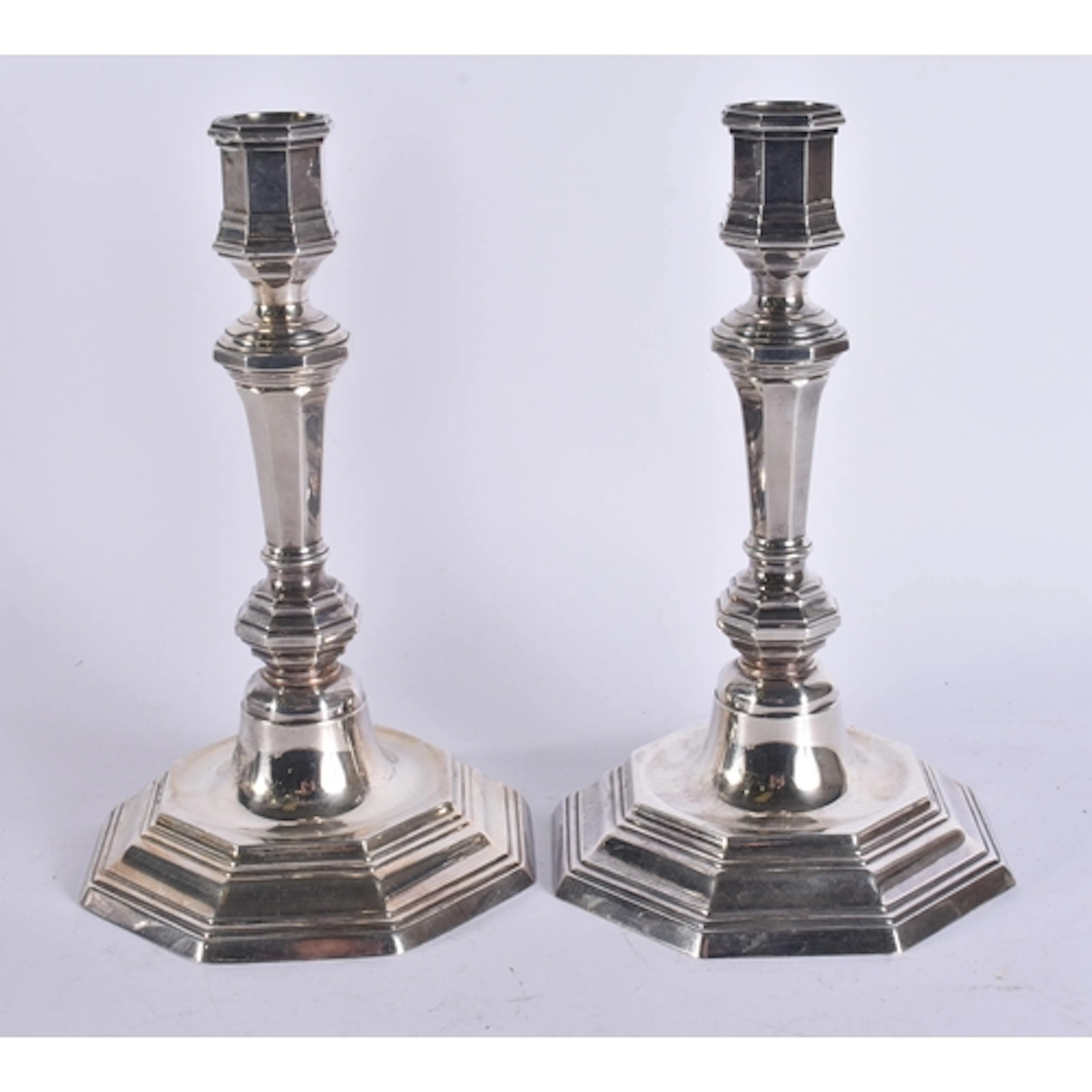 A PAIR OF FRENCH CHRISTOFLE SILVER PLATED CANDLESTICKS. 22.5...