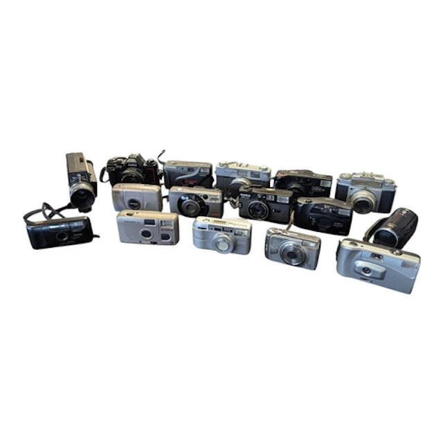 A collection of vintage 20th and 21st century cameras and ac...