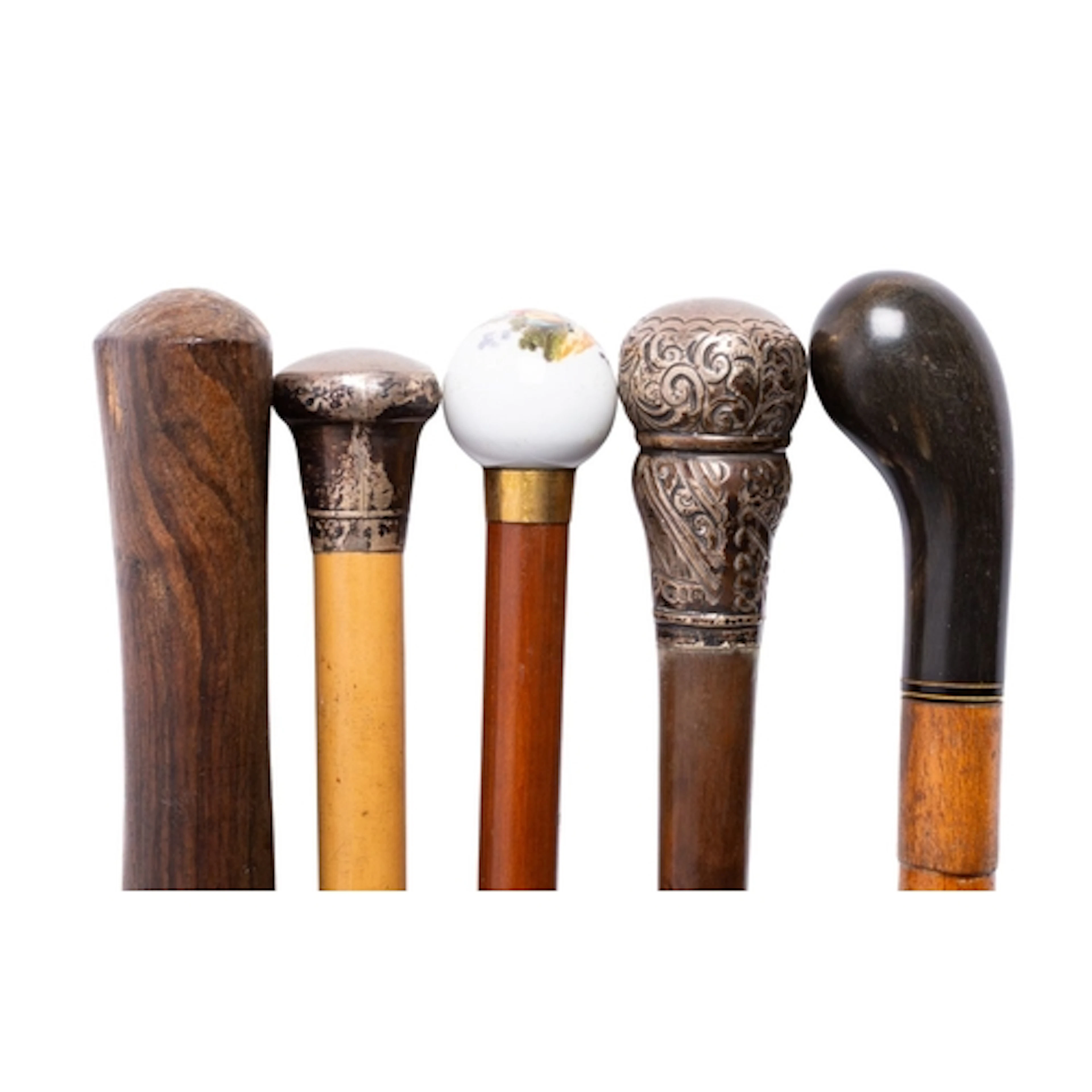 Five various walking sticks, comprising a silver mounted mal...