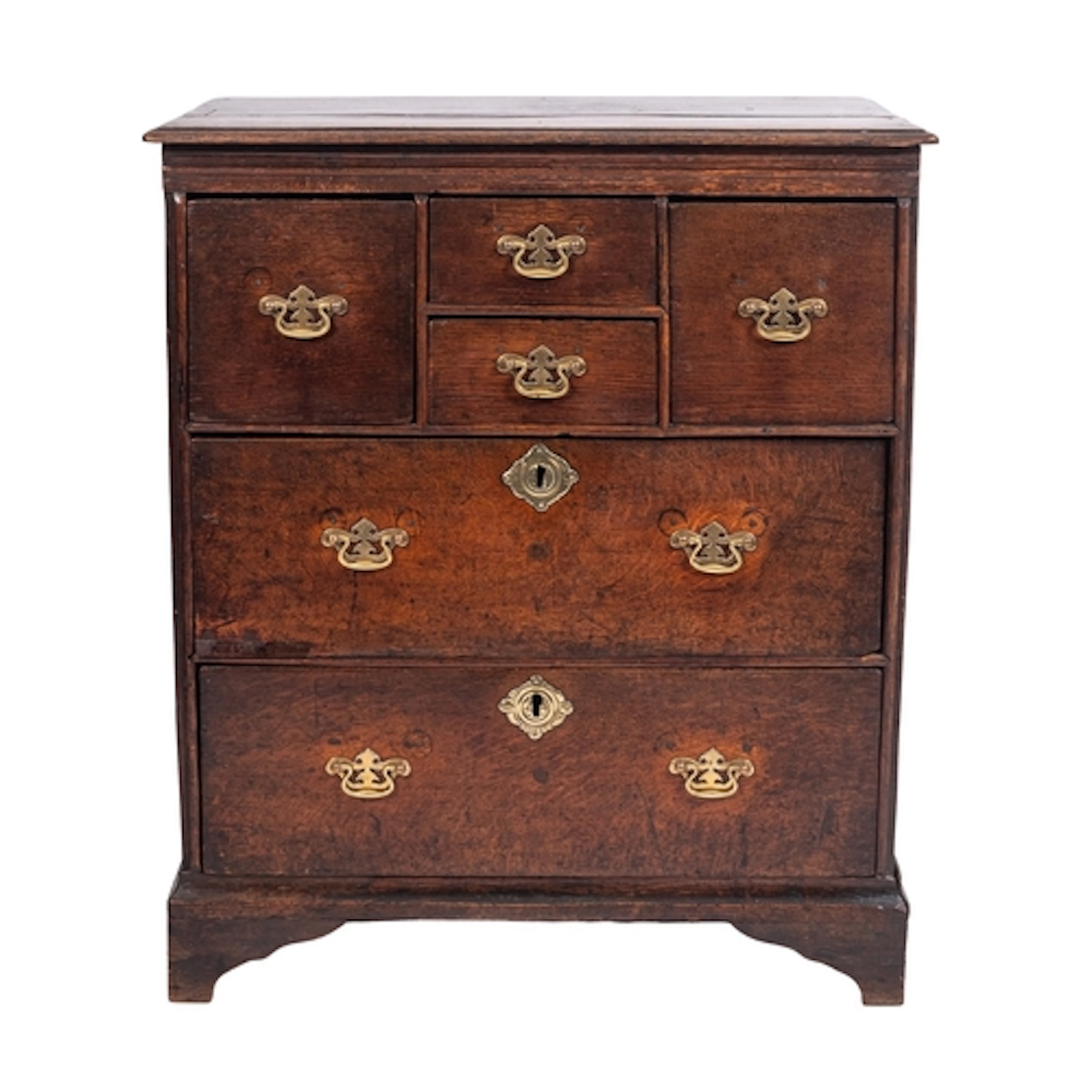 An oak chest of drawers, early 18th century; the top with mo...