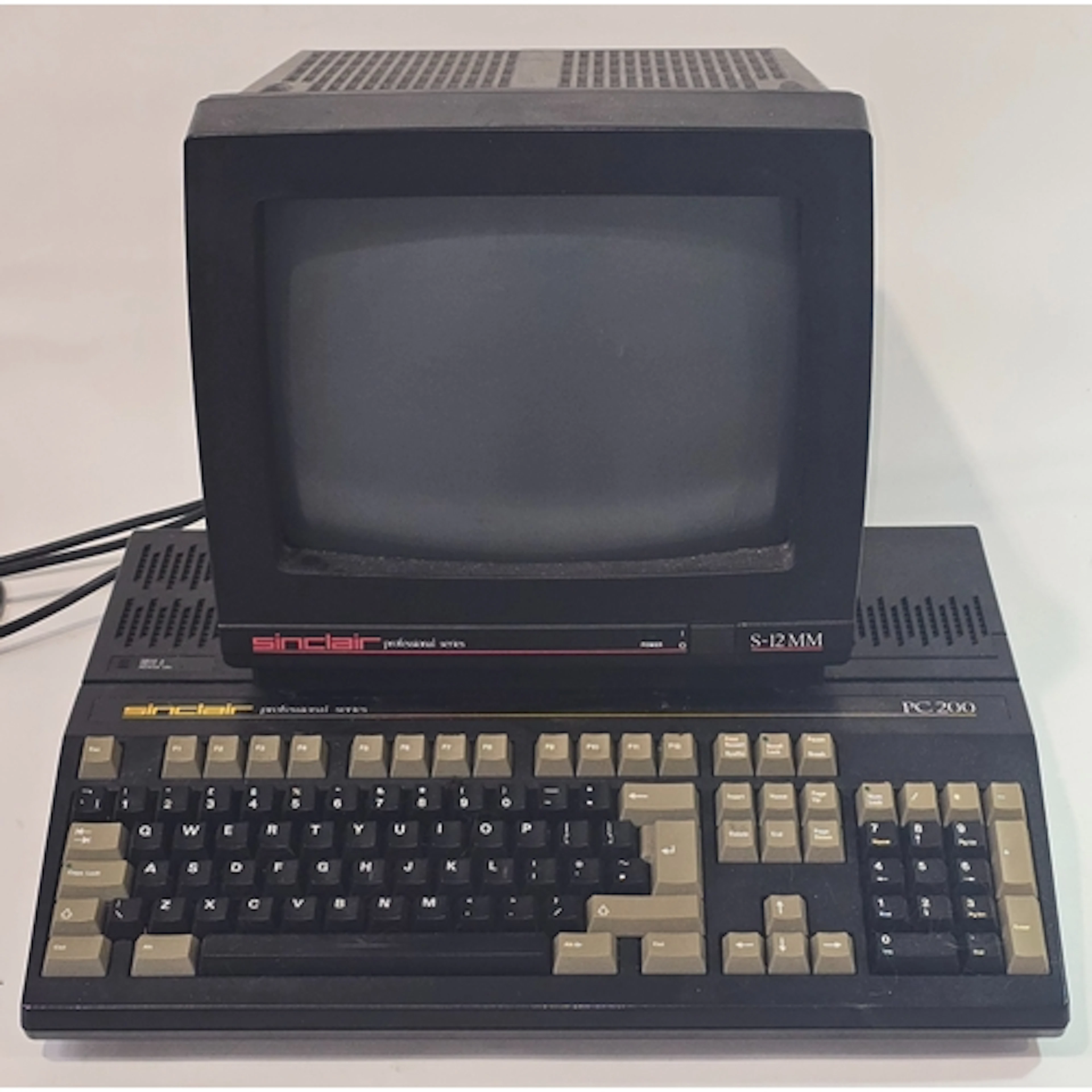 Vintage Sinclair PC200 Personal Computer together with S-12M...