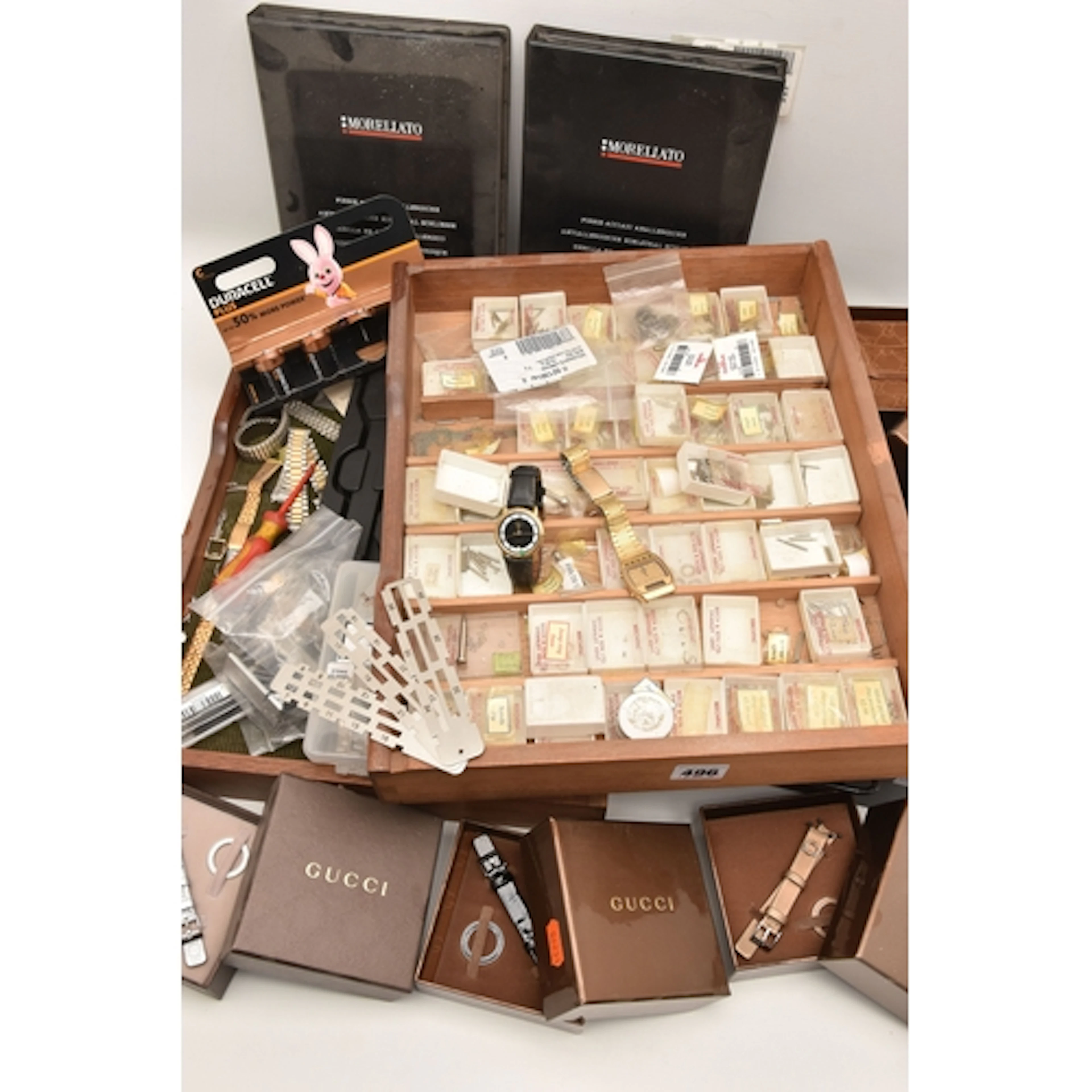 AN ASSORTMENT OF WATCH PARTS, to include a quantity of new w...