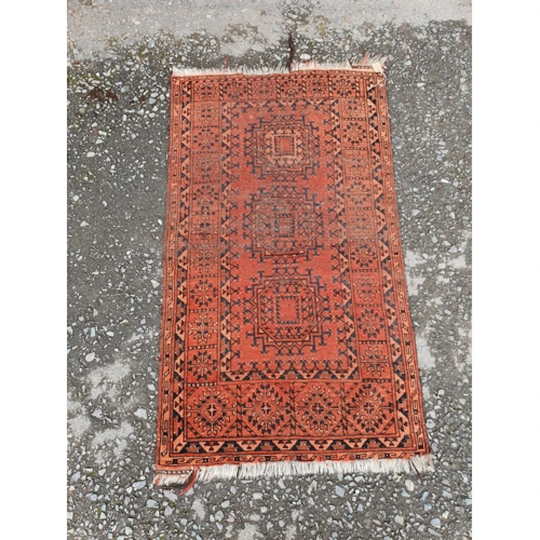 A Persian style multi bordered Rug on a red ground, 5ft L 2f...