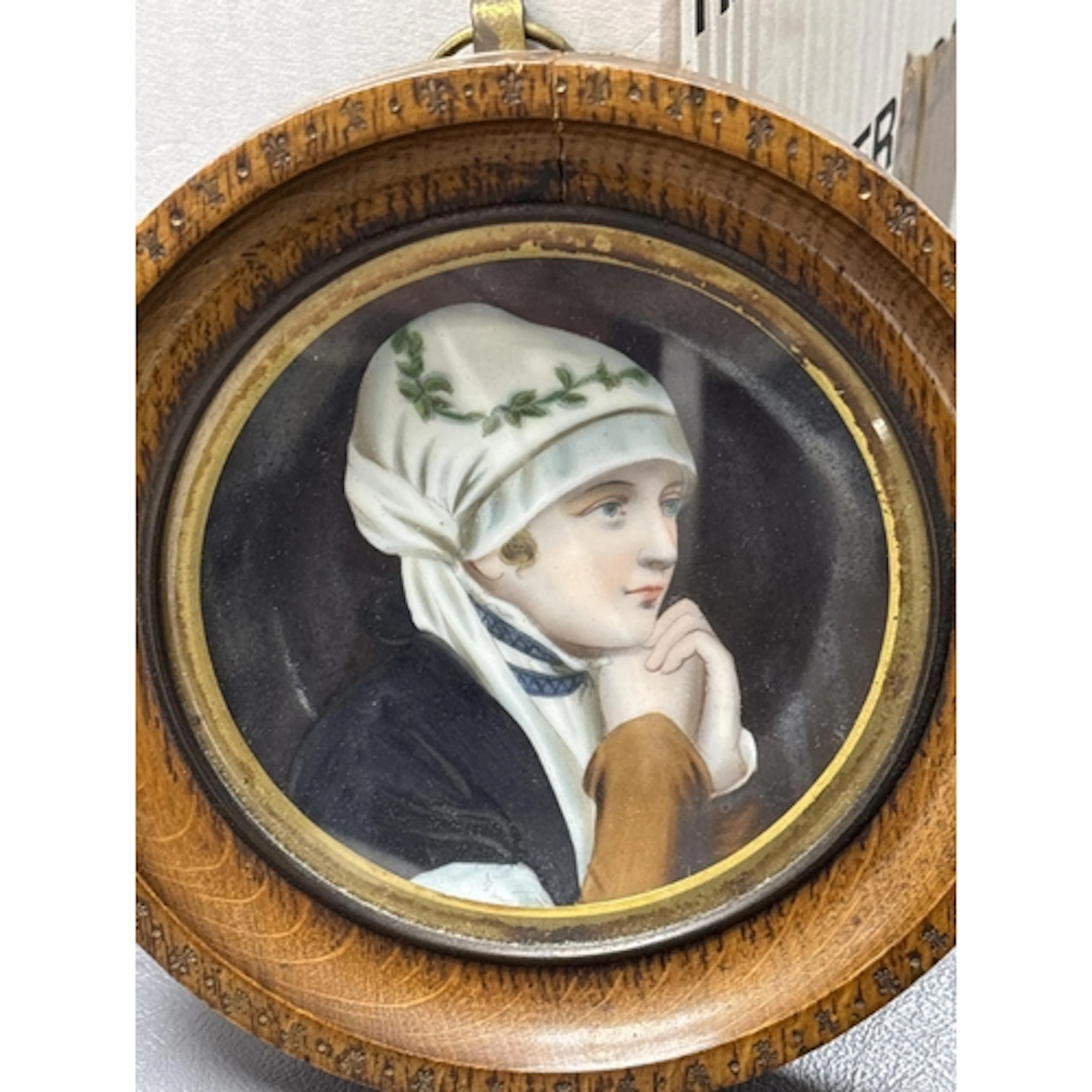 A Vienna type painted porcelain plaque deplaned lady, framed...