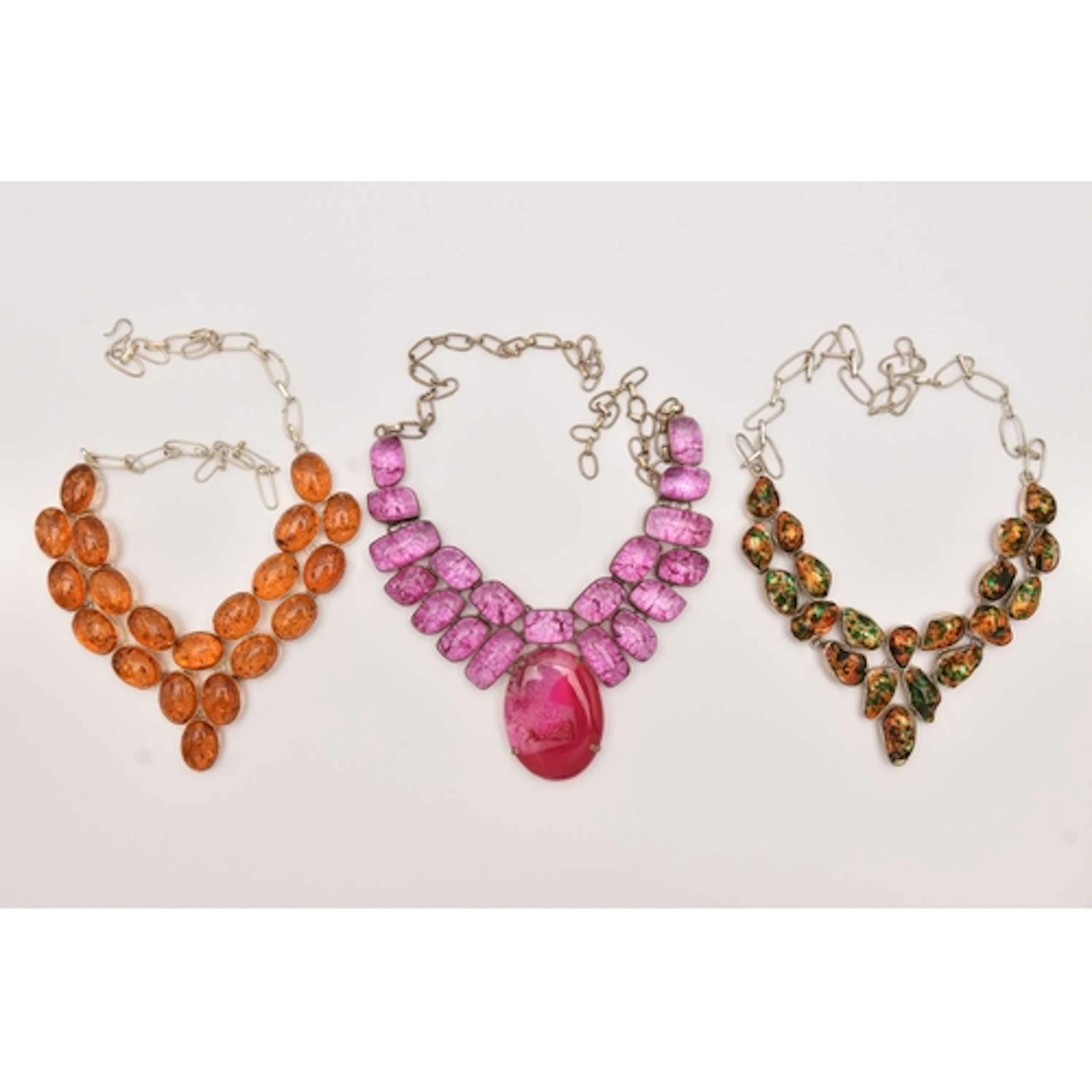 THREE LARGE WHITE METAL GEM SET STATEMENT NECKLACES, to incl...