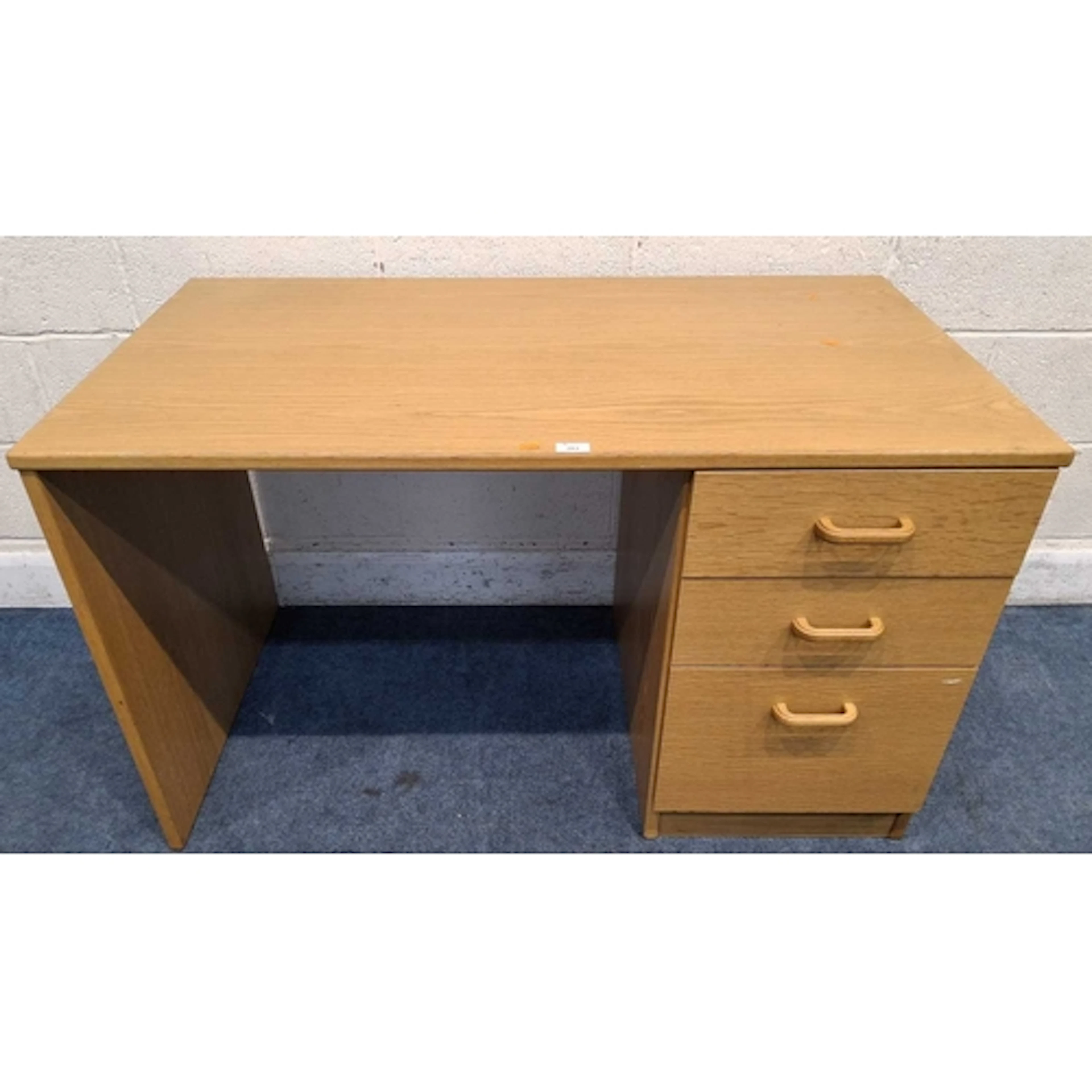 A MODERN OAK DESK, with three drawers (width 120cm x depth ...