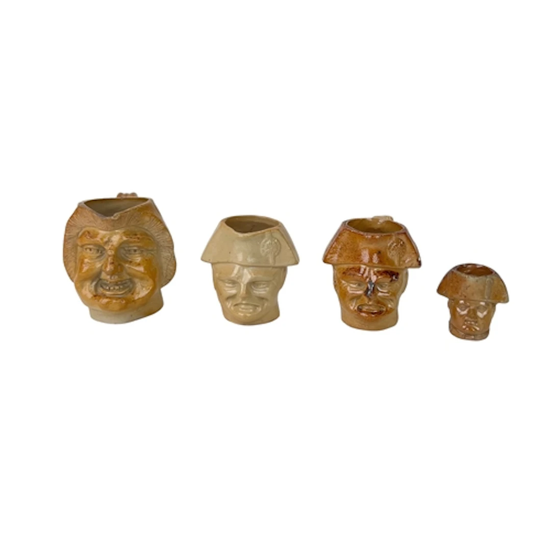 THREE STEPHEN GREEN SALT-GLAZED STONEWARE CHARACTER JUGS OF ...
