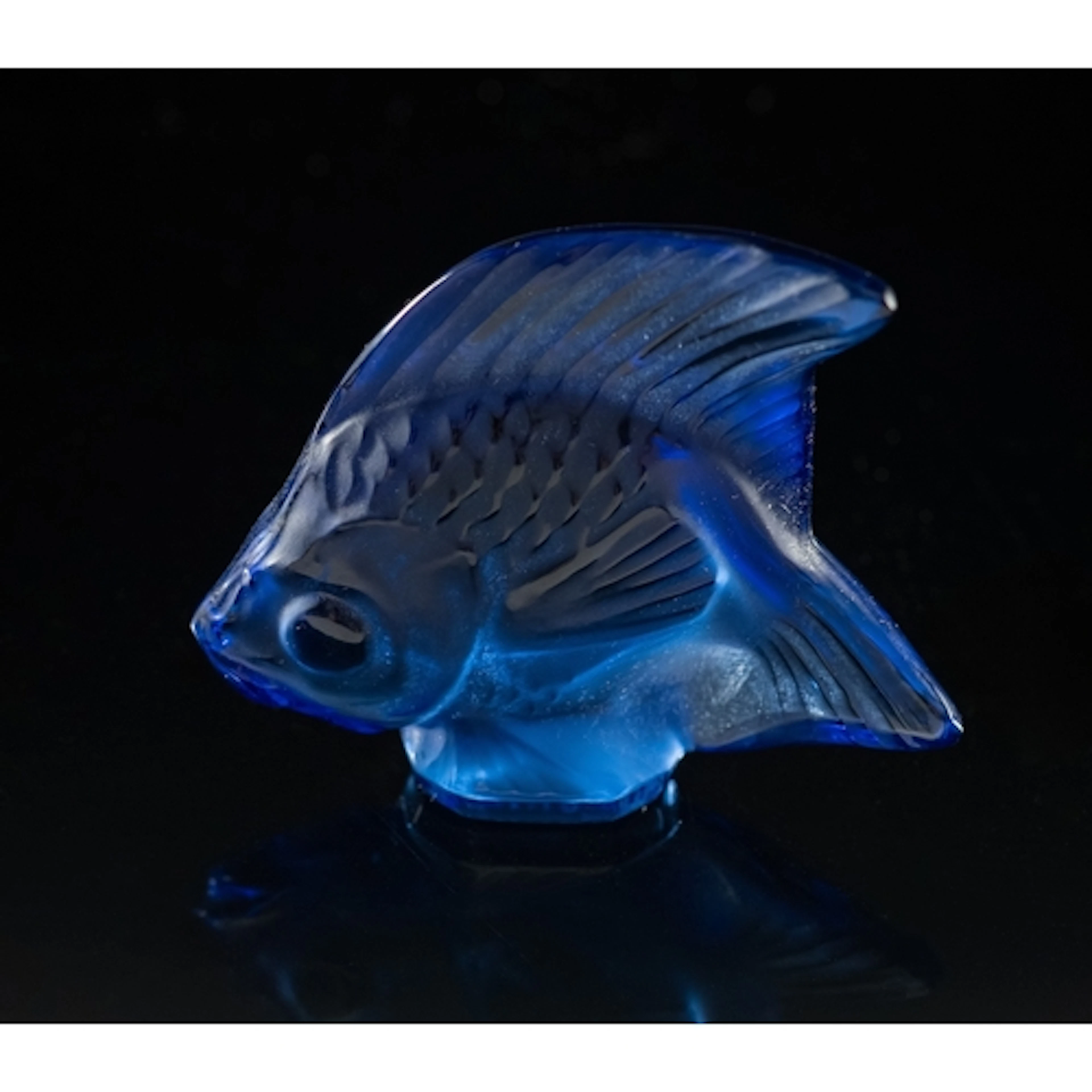 Three Lalique Cristal Poisson in light blue, dark blue and t...