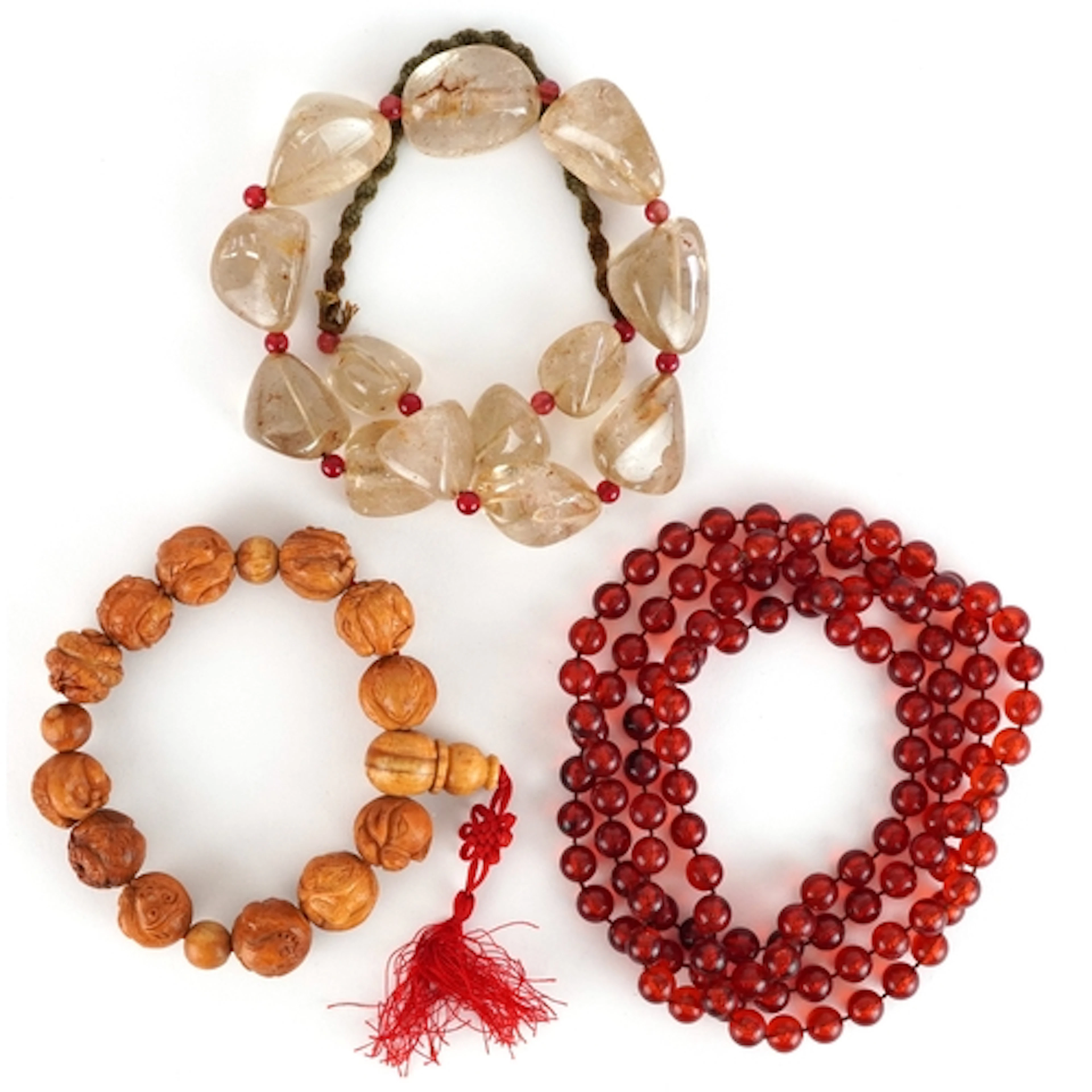 Necklaces and bracelet comprising a carved wood bracelet, ro...