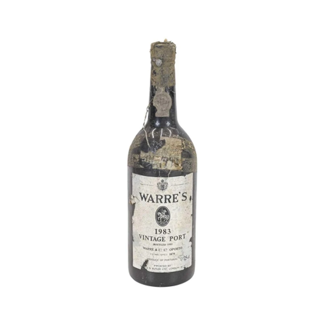 A single bottle of Warre's 1983 vintage port. .
