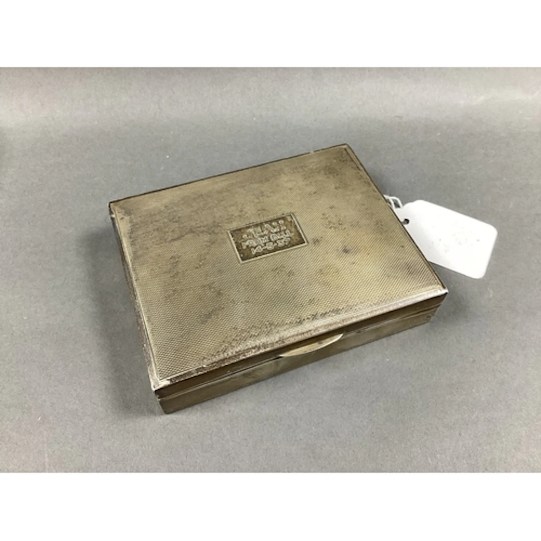 A Hallmarked Silver Cigarette Box, S&M, Birmingham 1936, eng...