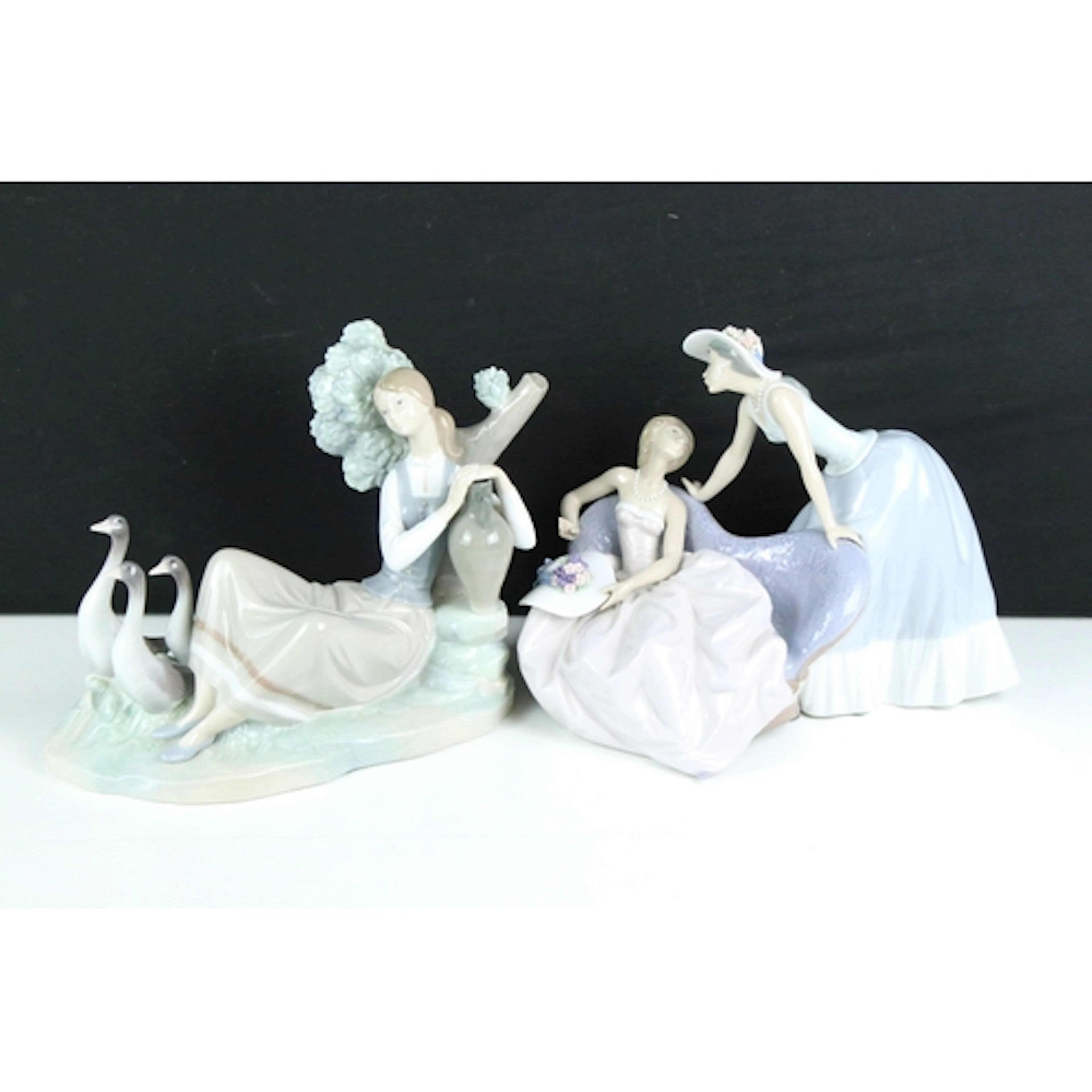 Lladro porcelain figure of 'Woman Carrying Water', together ...