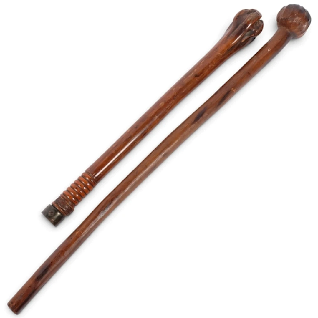 2 wooden clubs, largest L66cm