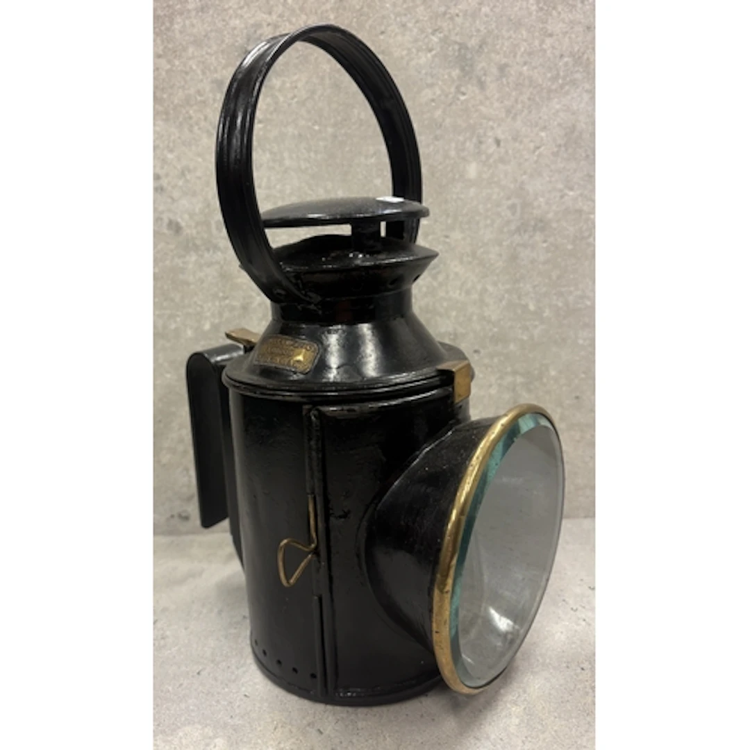 A Veritas Lamp Works "L.M.S" railway lantern. Est. £20 - £30...