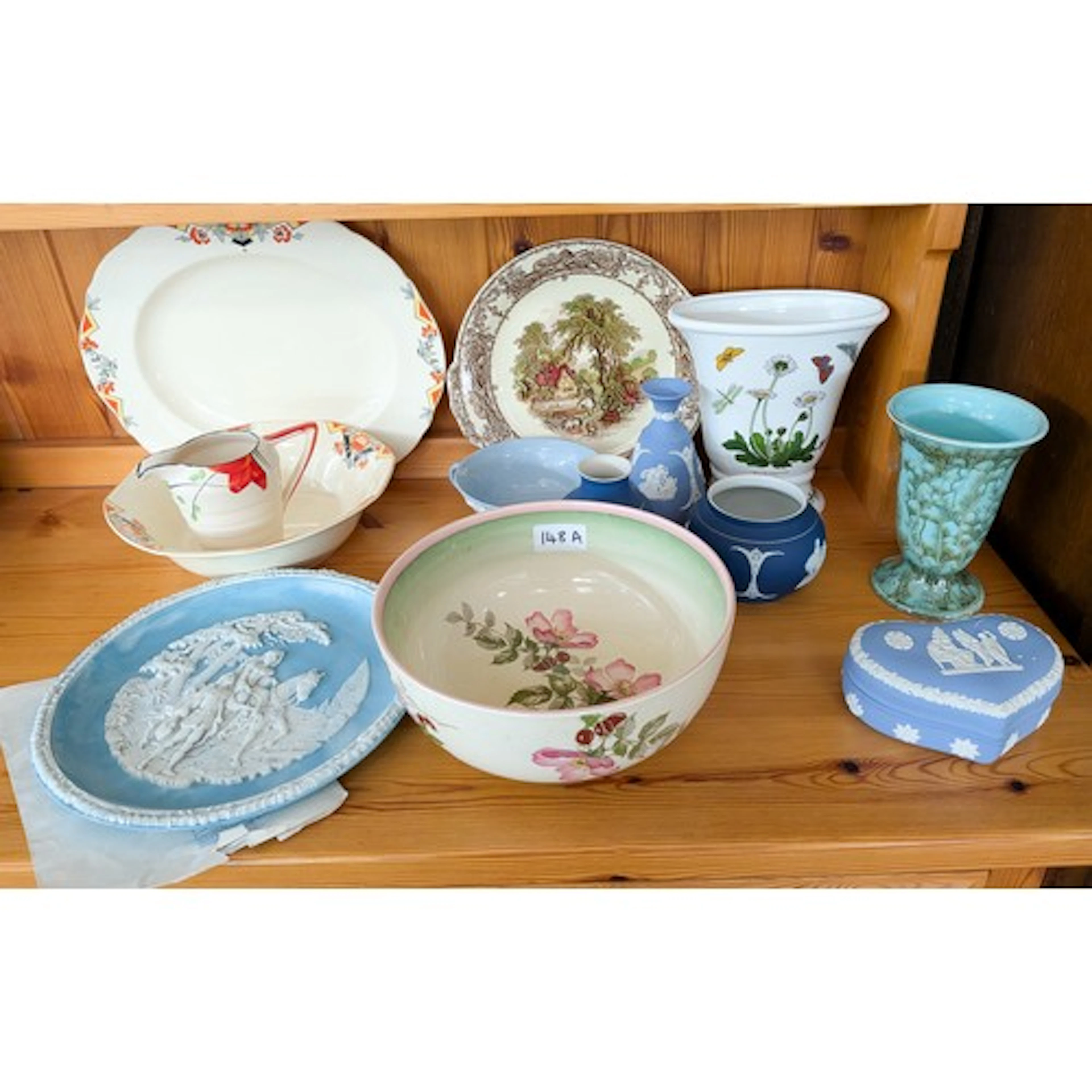 Clarice Cliff rose decorated fruit bowl, Wedgwood jasper war...