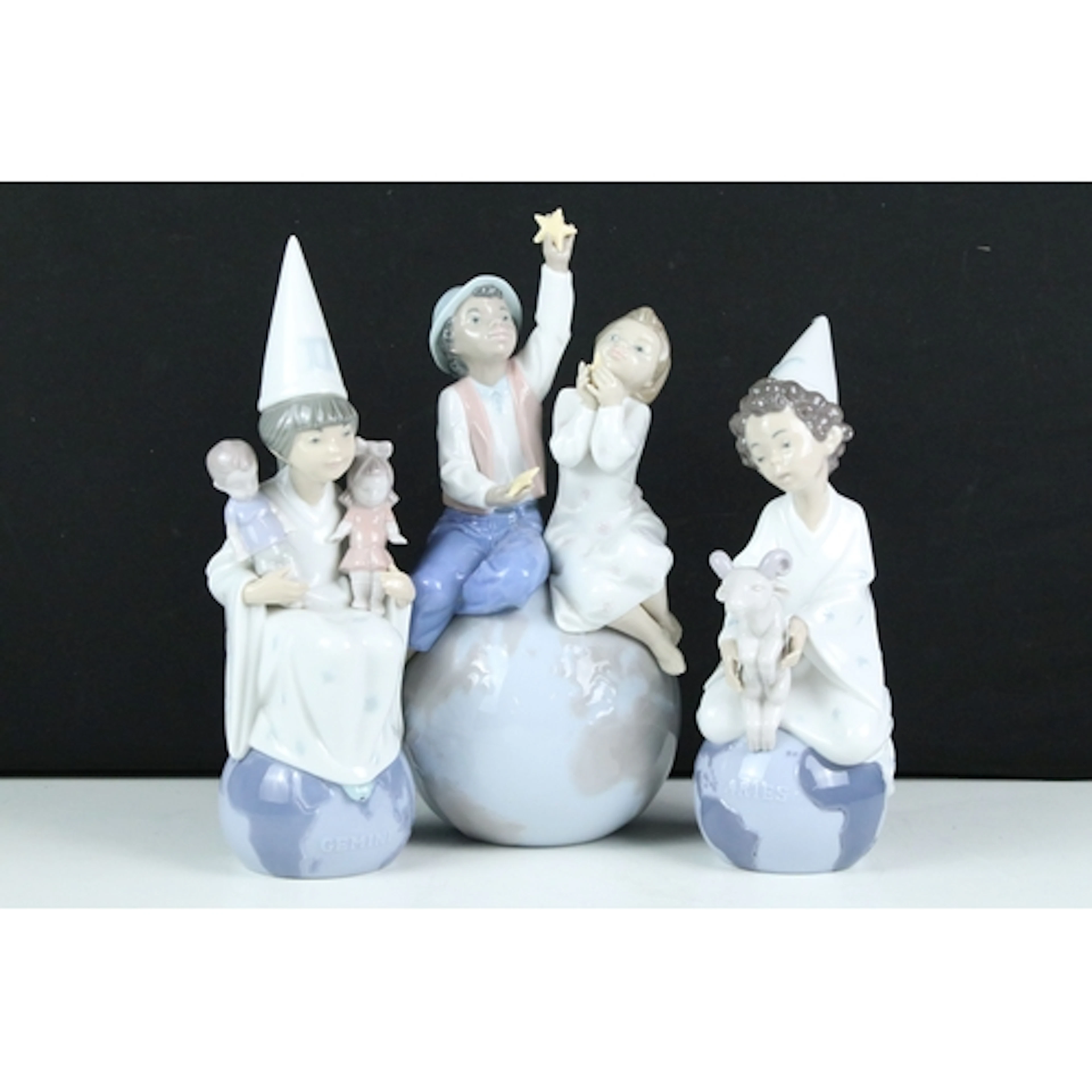 Three Lladro figurines to include #6221 'Aries', #6219 'Gemi...