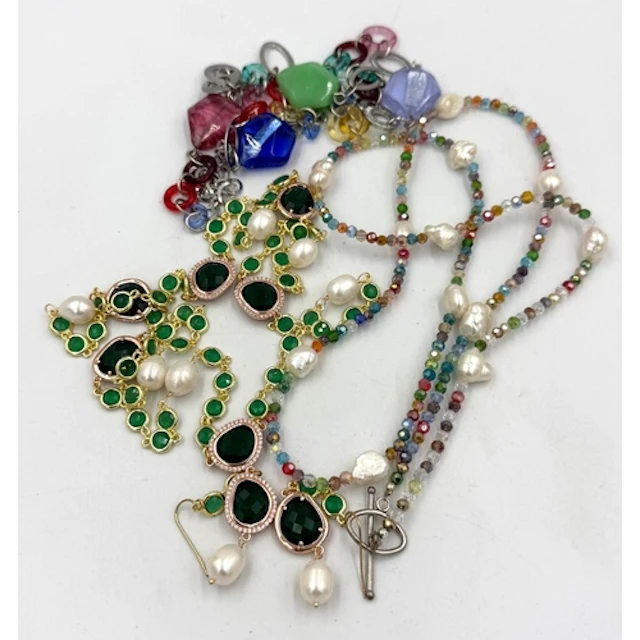 A selection of costume jewellery, including a variety of nec...