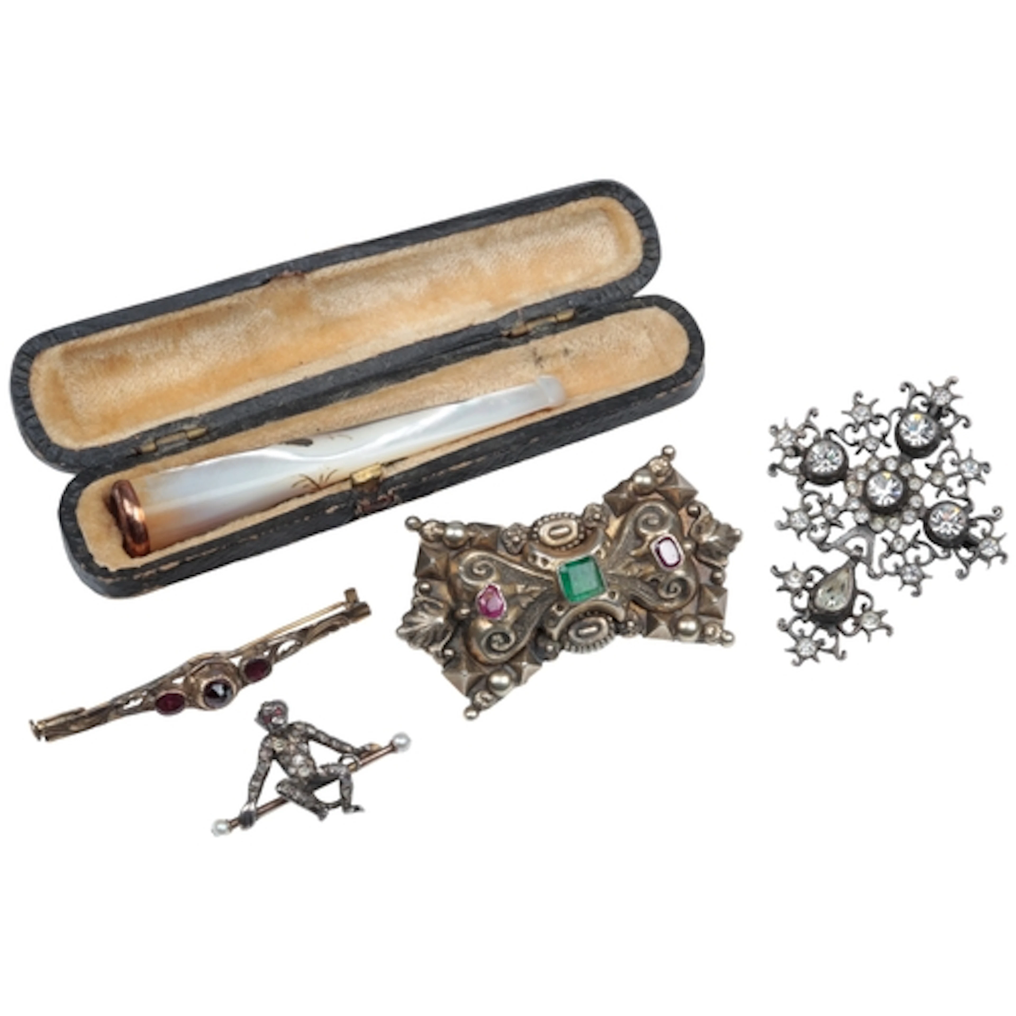A white metal and two colour paste monkey bar brooch, approx...