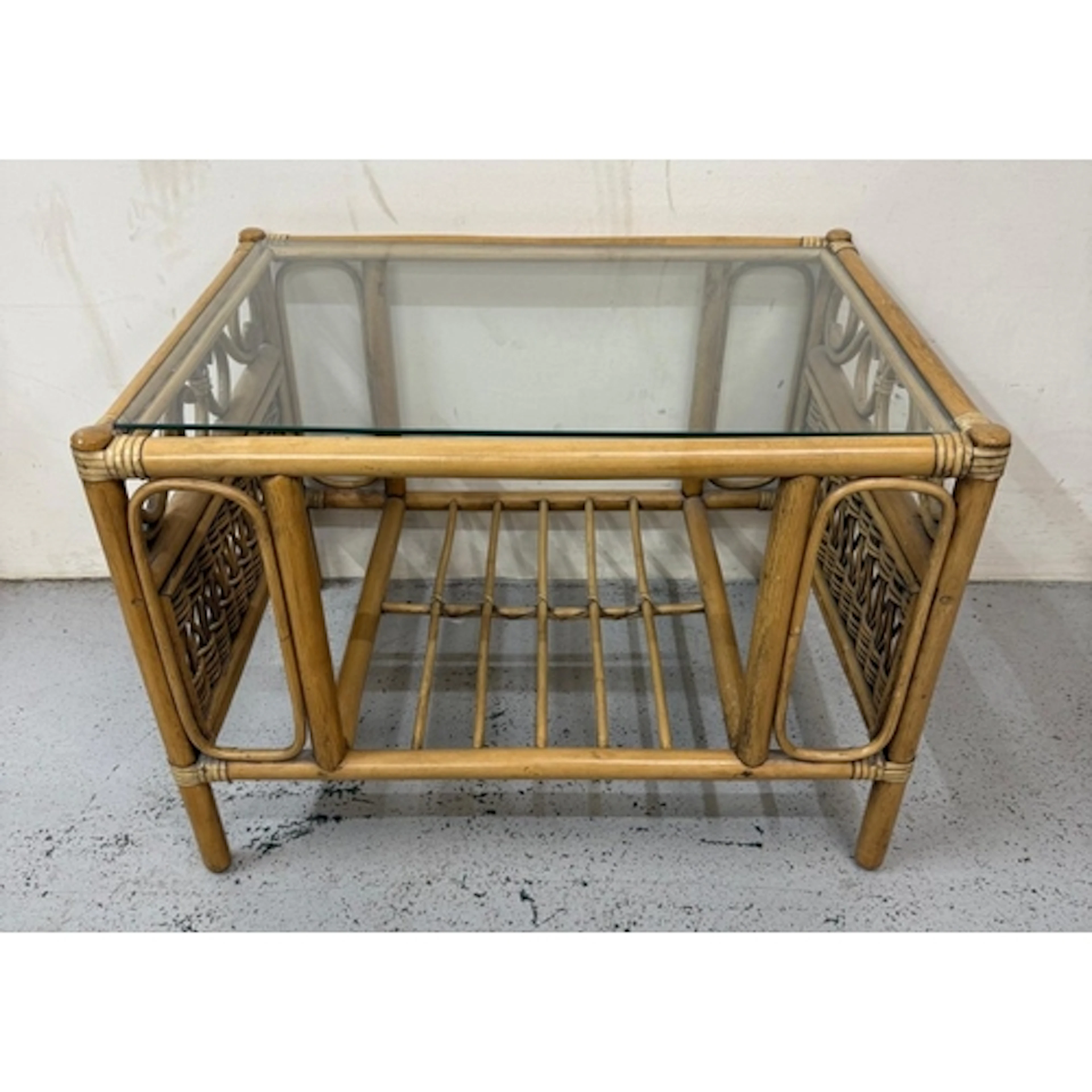 A cane glass topped coffee table