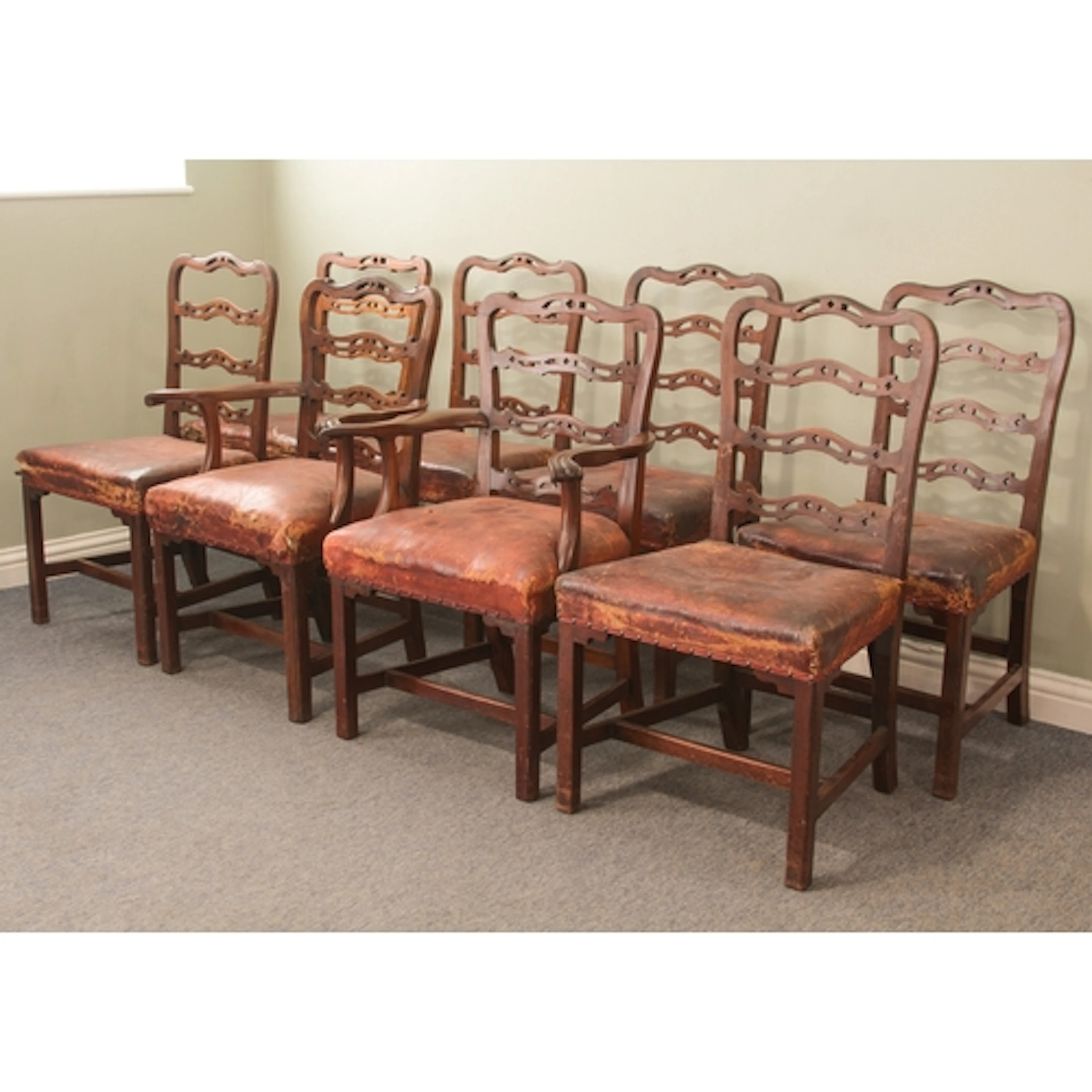 A set of eight 19th century mahogany dining chairs, in the 1...