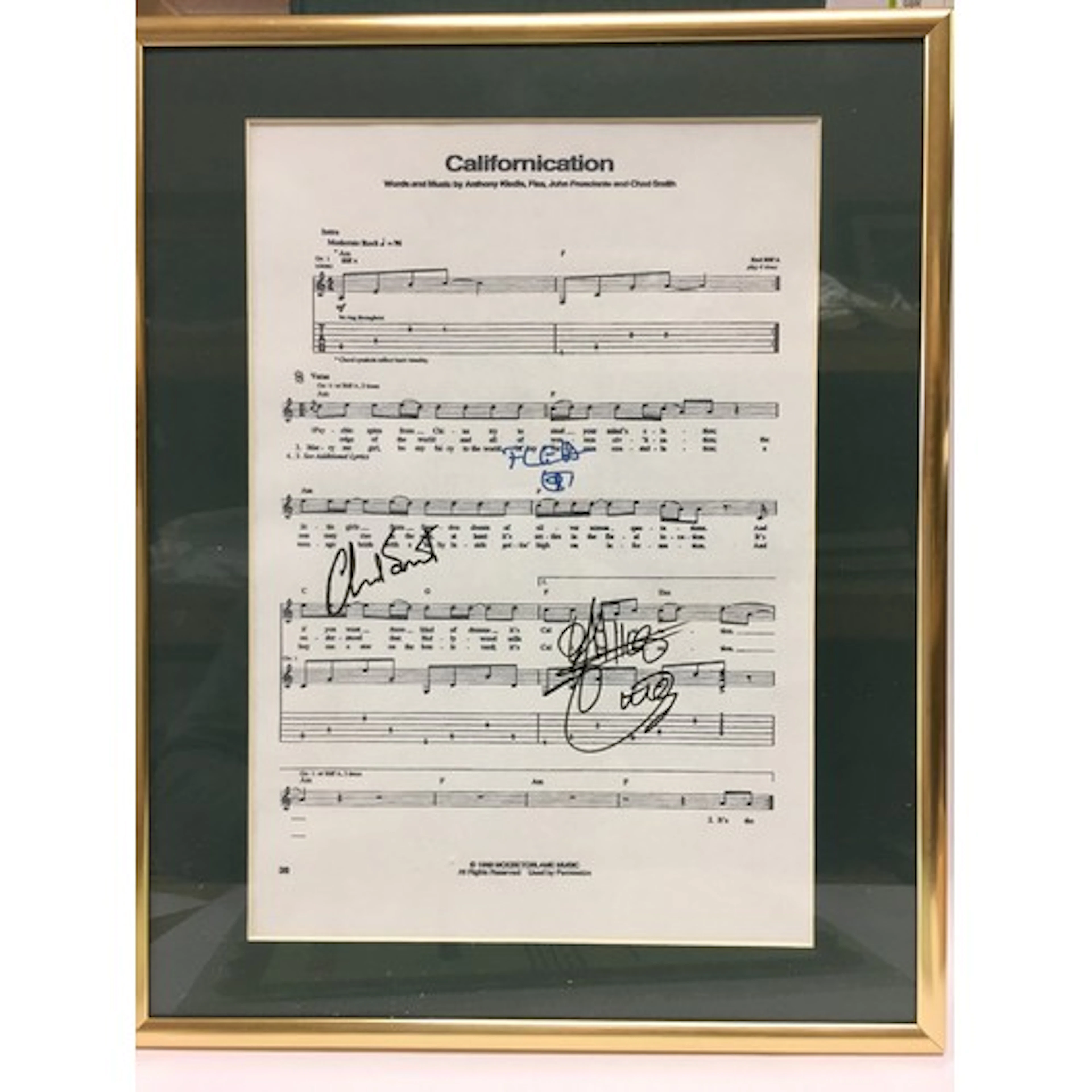 A framed and glazed signed Red Hot Chili Peppers Californica...