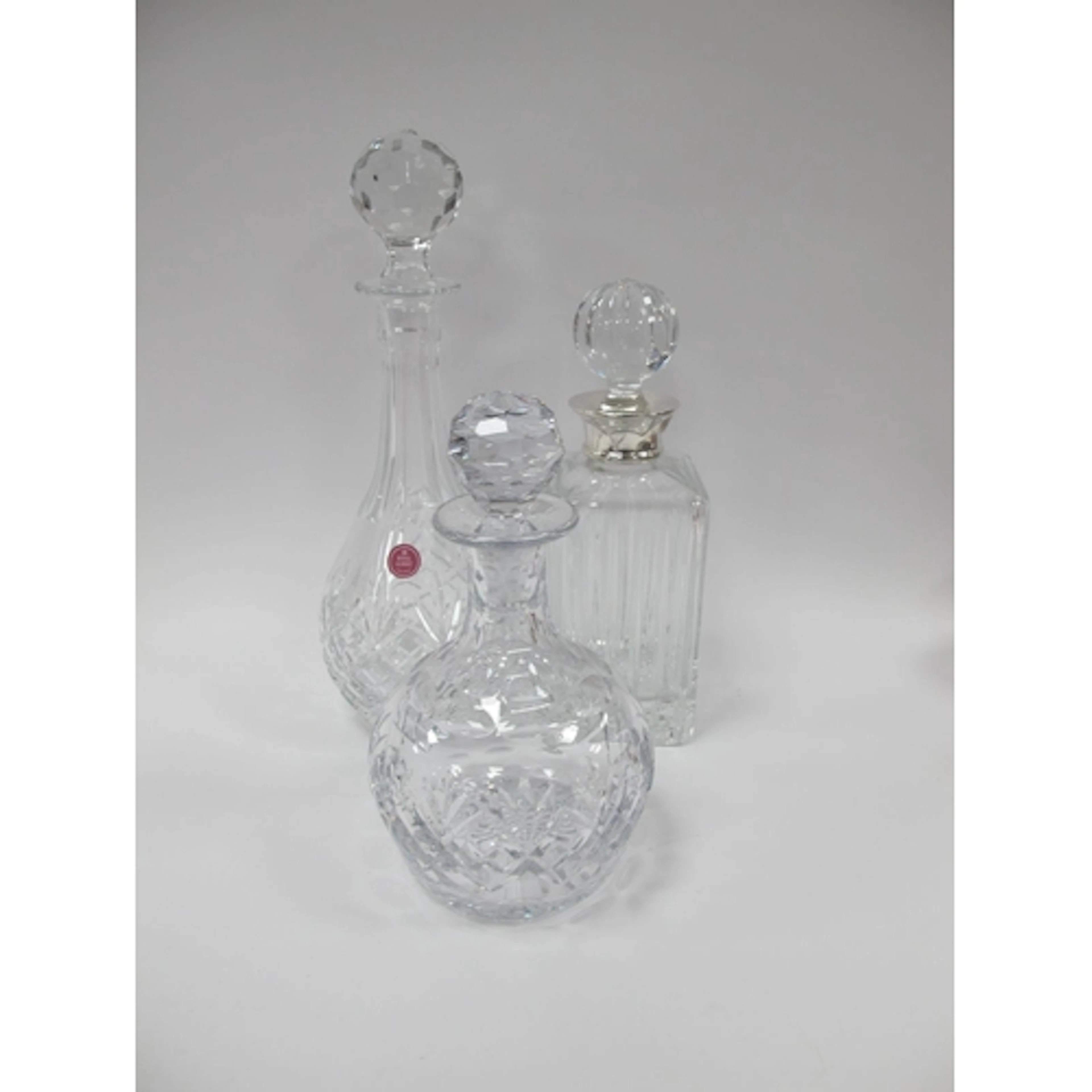 Three Crystal and Cut Glass Decanters, including square-form...