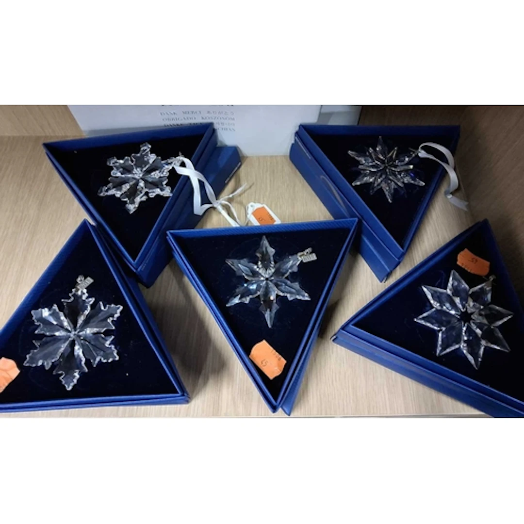 FIVE BOXED SWAROVSKI ANNUAL EDITION CHRISTMAS ORNAMENTS, com...
