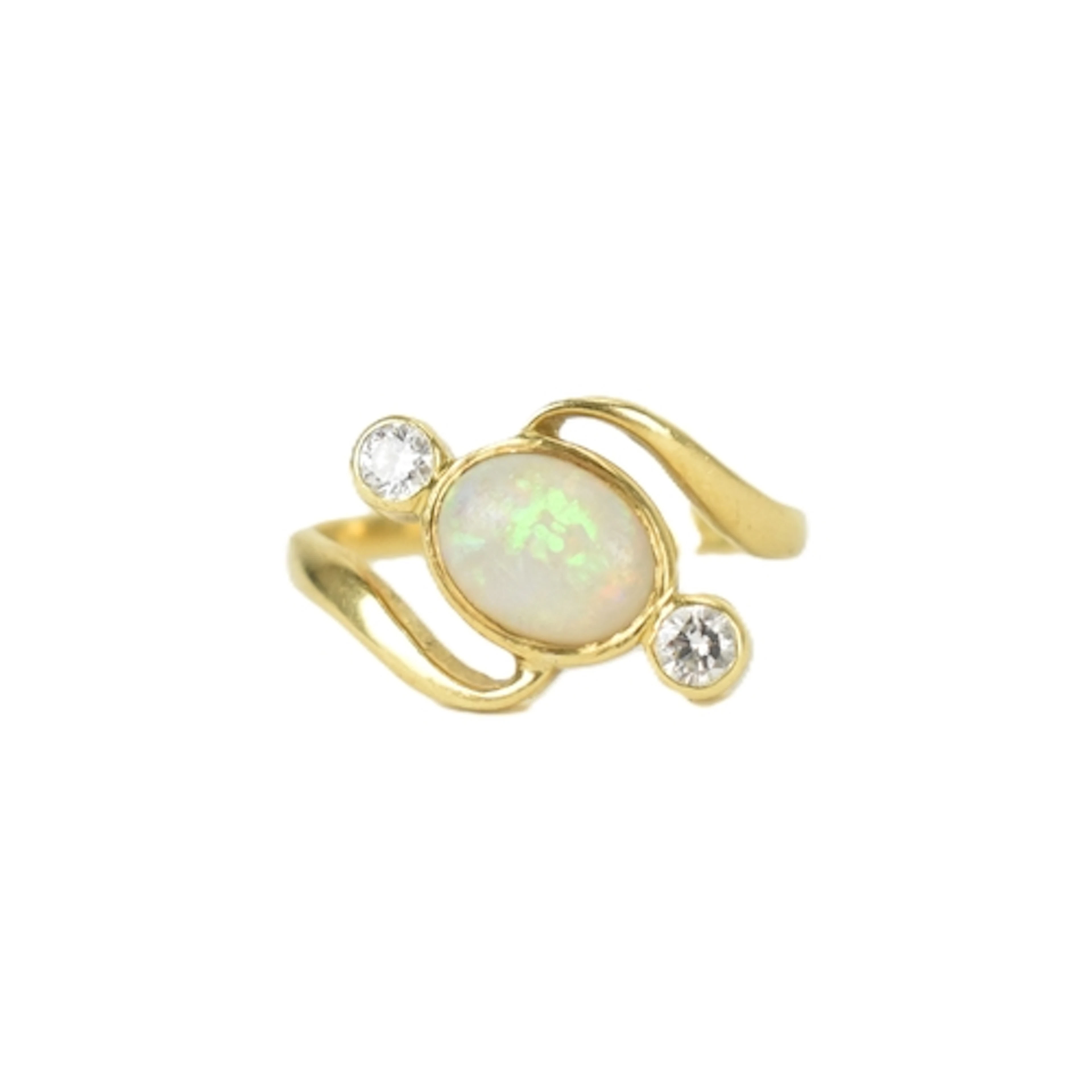An opal and diamond 18ct gold ring, the central opal measuri...