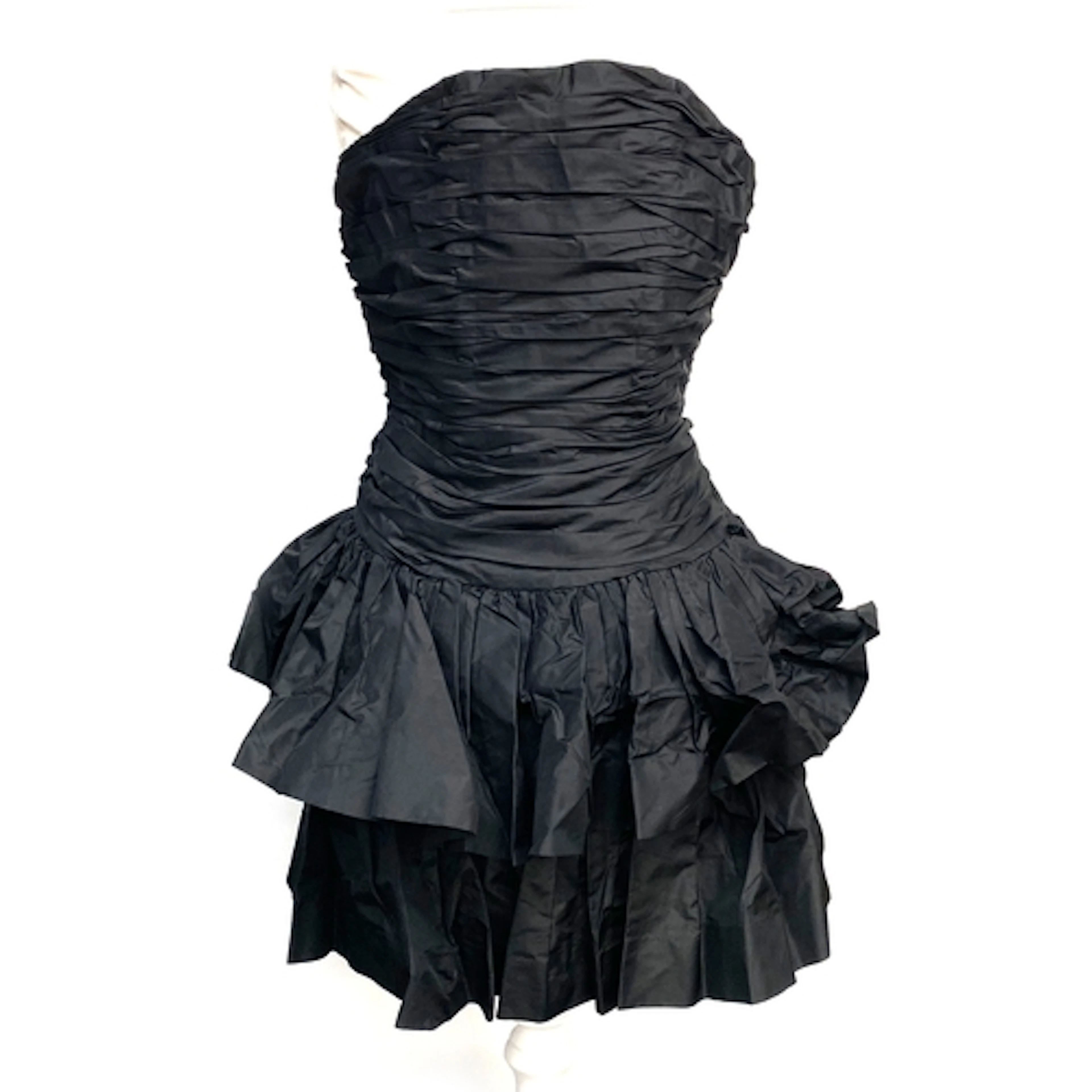 A Jacques Azagury black silk mini dress with ruffled skirt, ...