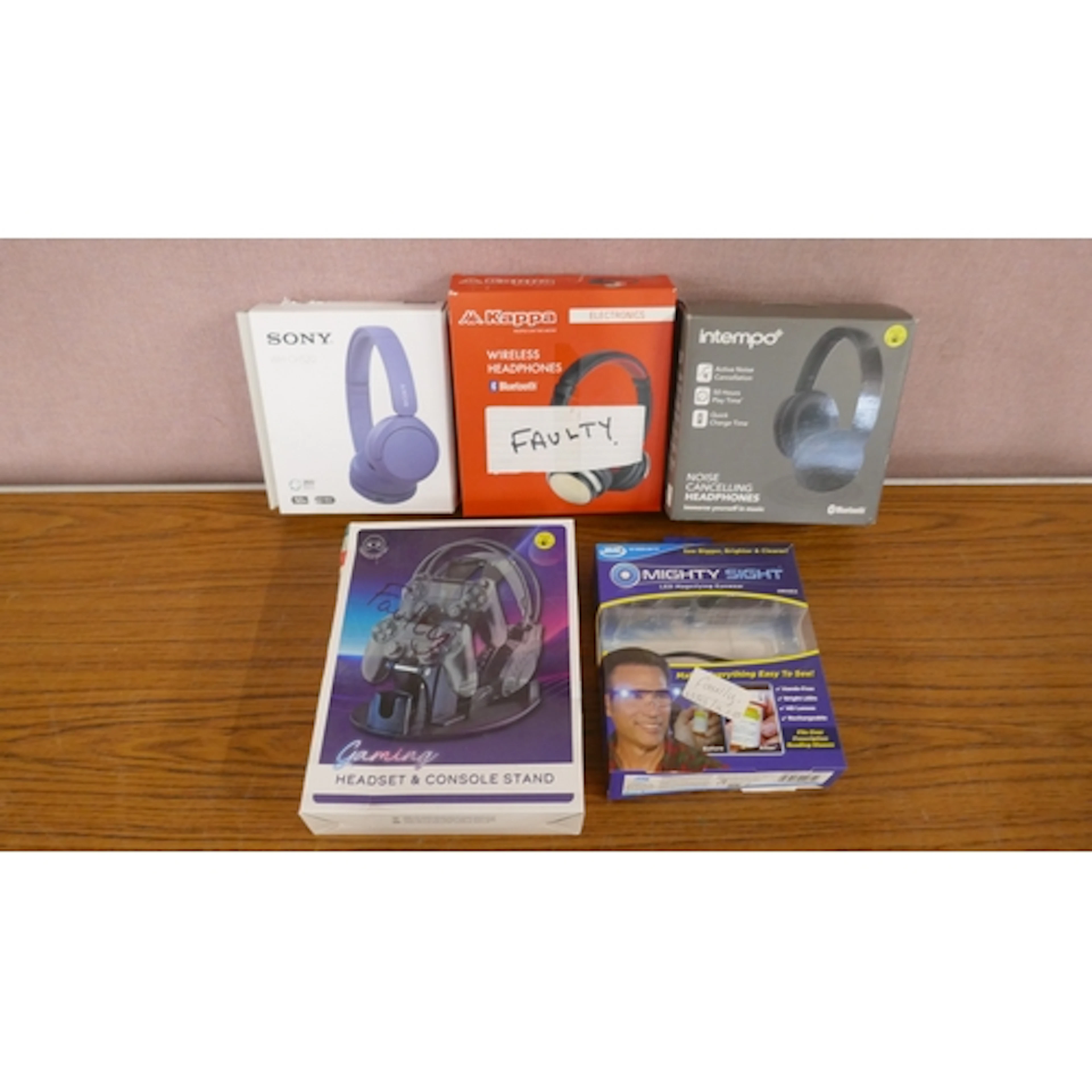Five various tech items including, Sony headphones, gaming s...