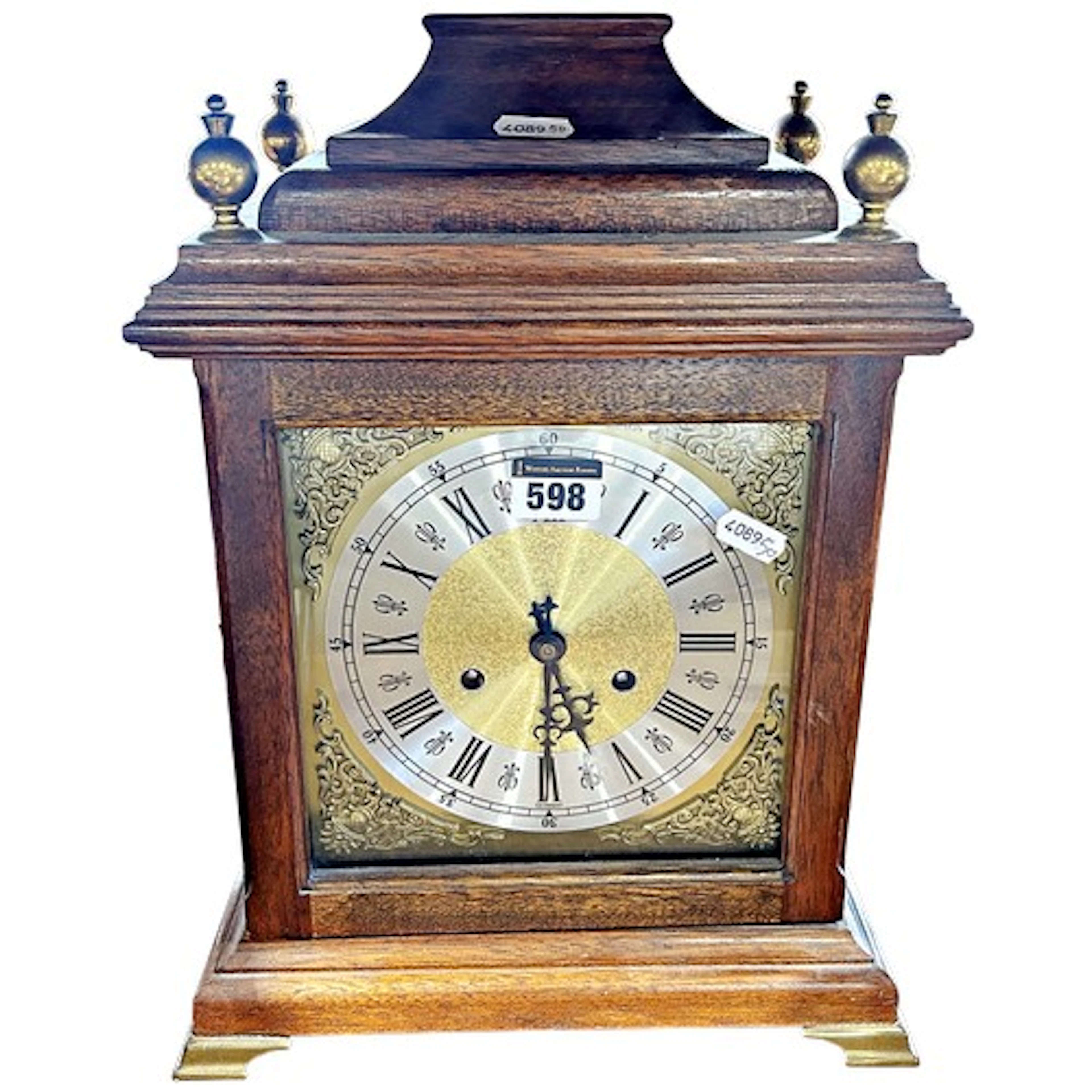 A German reproduction oak cased bracket clock in the Georgia...
