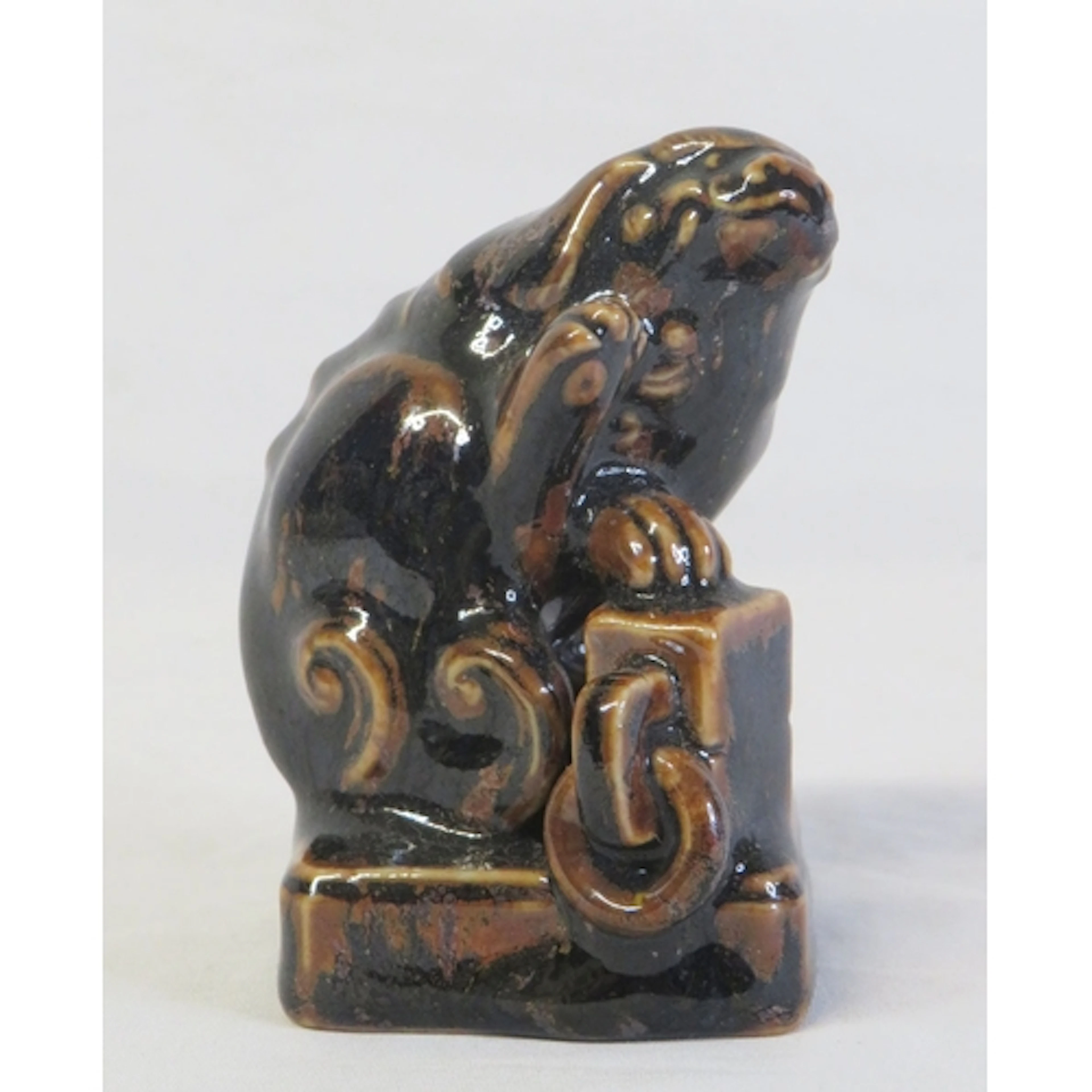 Chinese Pottery Figure Mythical Creature with a brown in the...