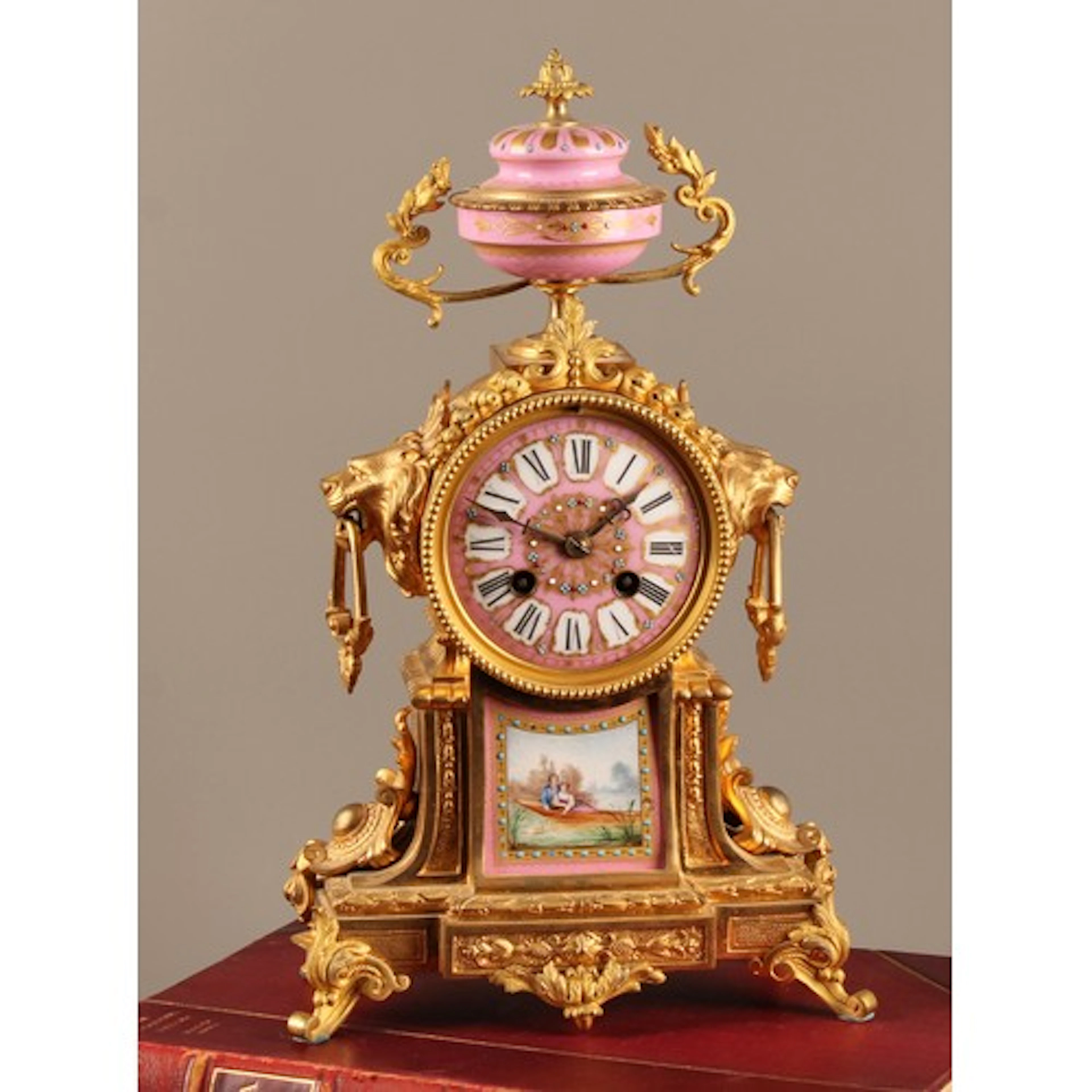 A late 19th century French ormolu mantel clock, the case ins...