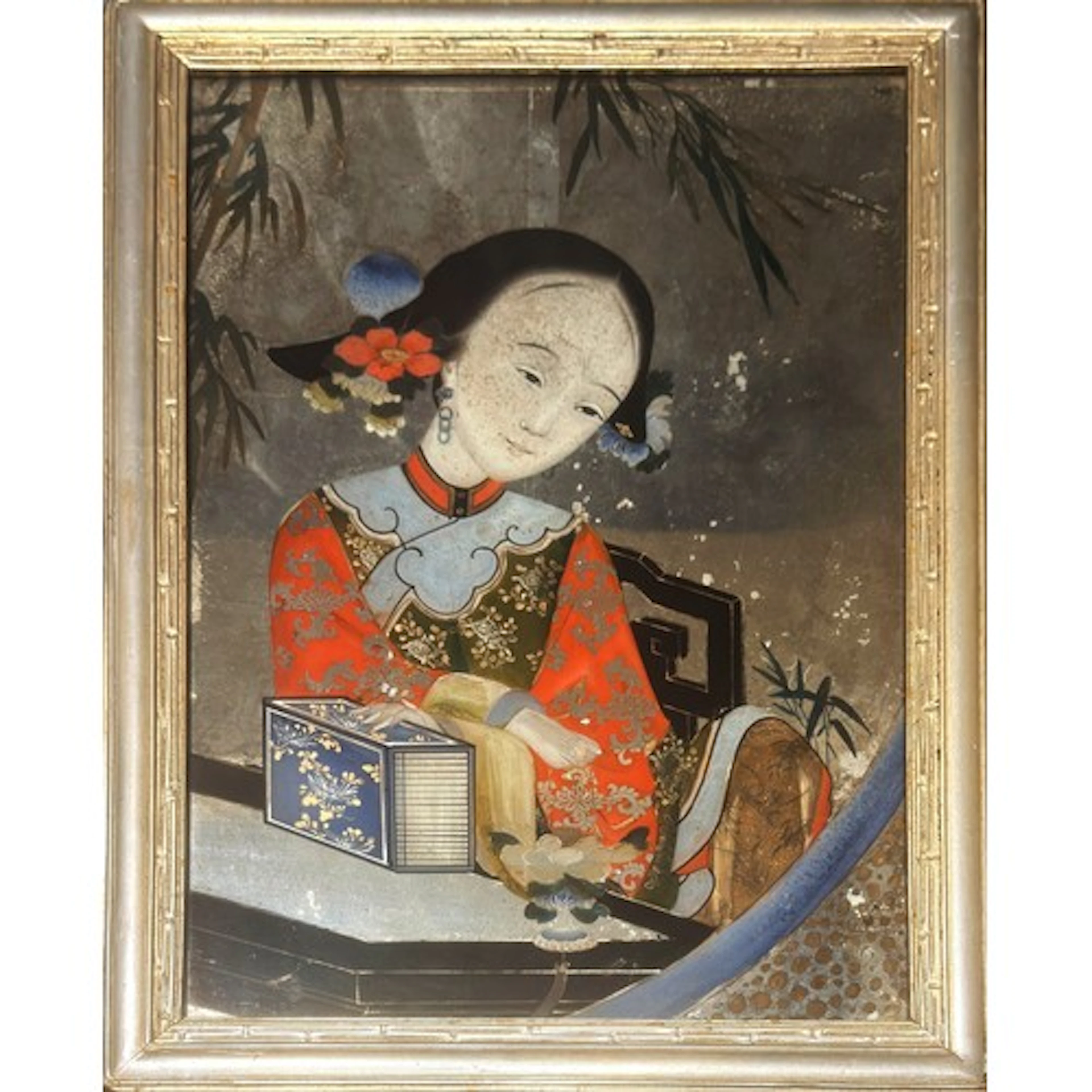 A decorative Chinese reverse painted wall mirror painted wit...