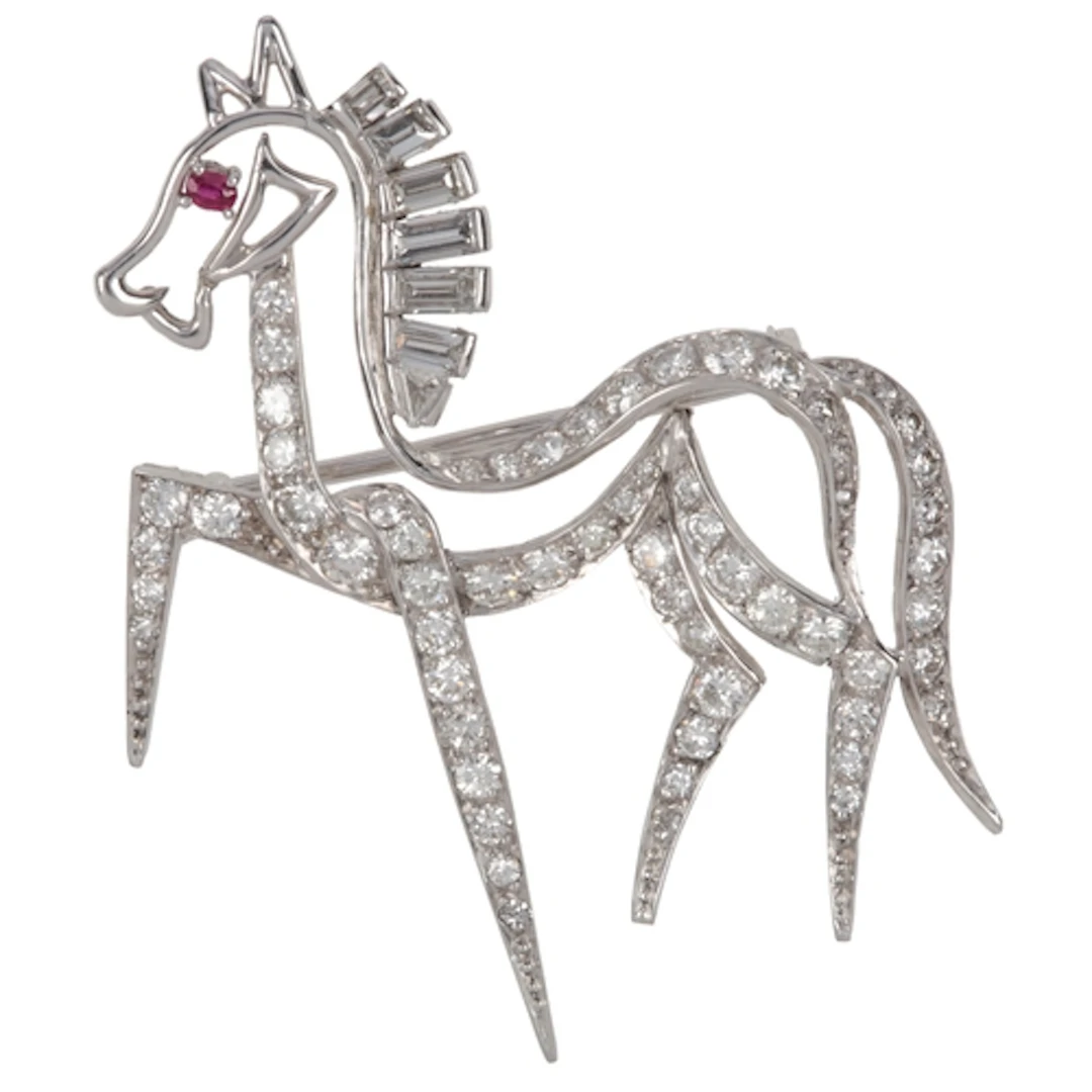 An attractive diamond brooch, 1960s, designed as a horse, in...
