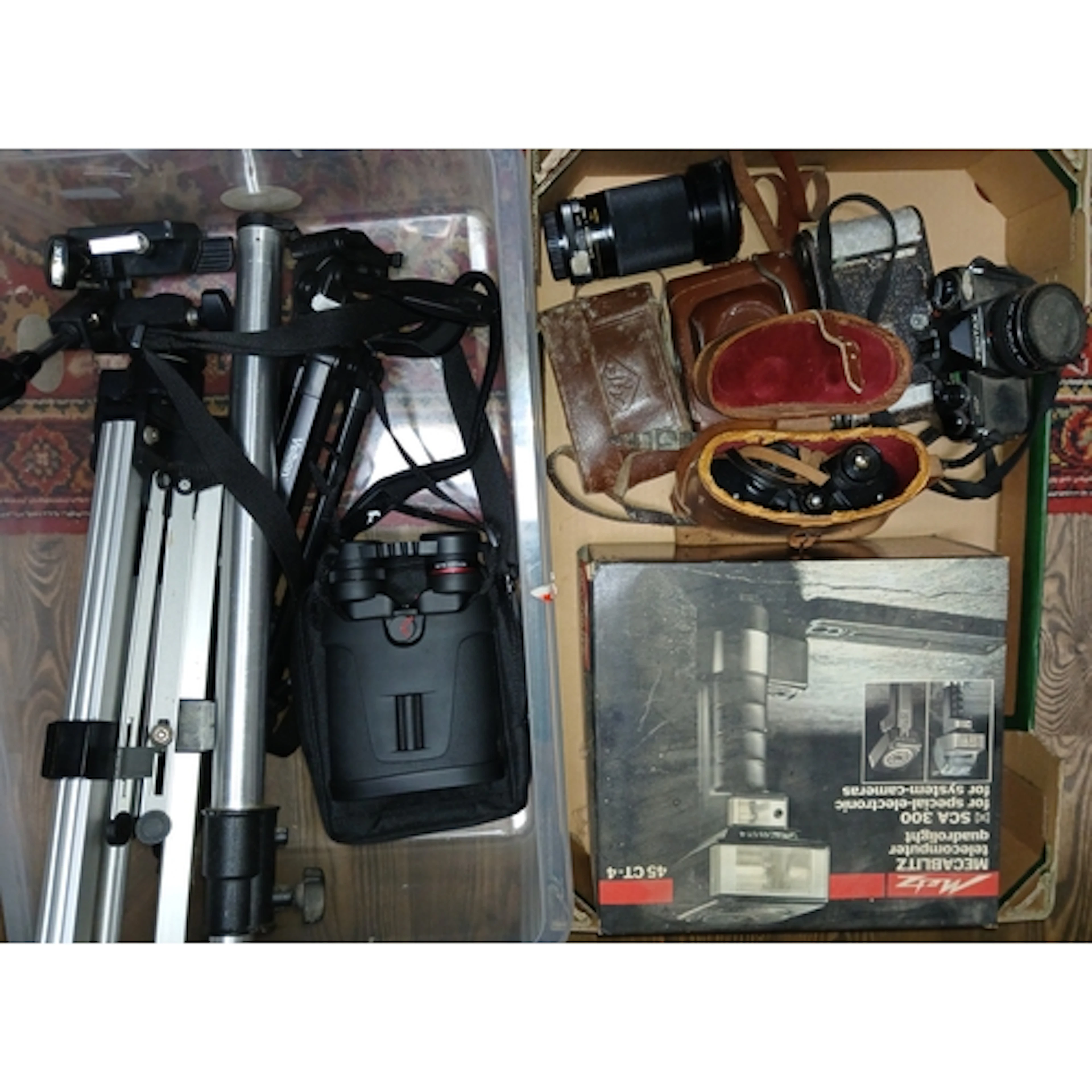 Two boxes ofg assorted cameras and binoculars including a pa...