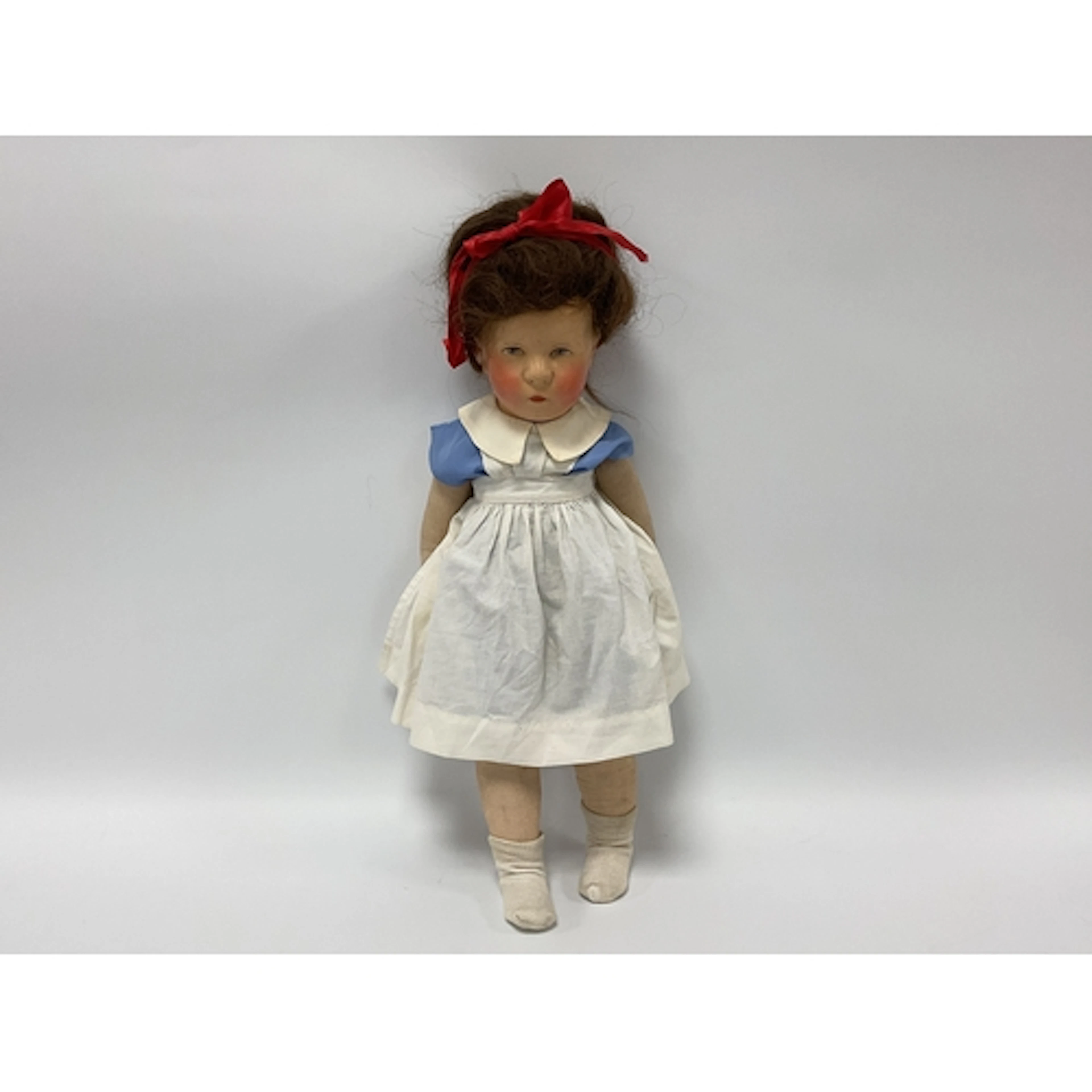 A Kathe Kruse Doll, with painted hard plastic swivel head, b...