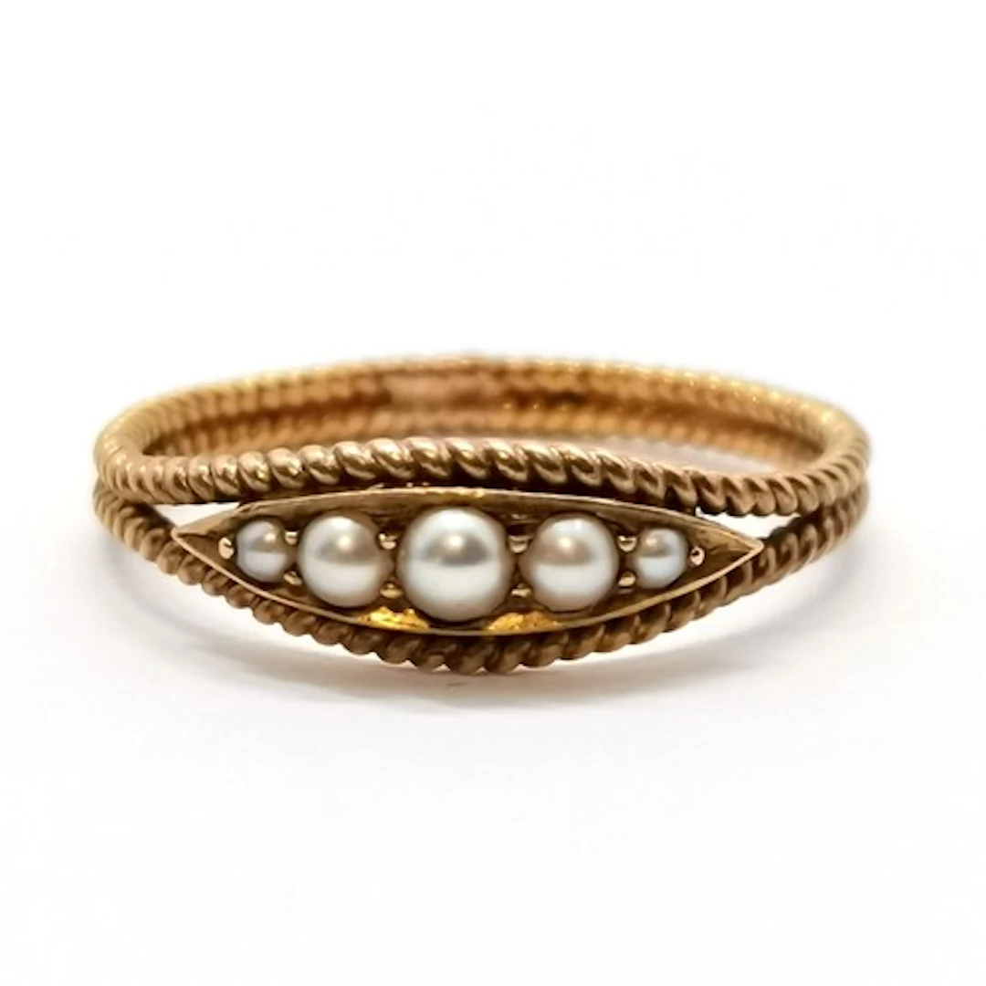 Antique (touch tests as 14ct) gold pearl set ring with doubl...