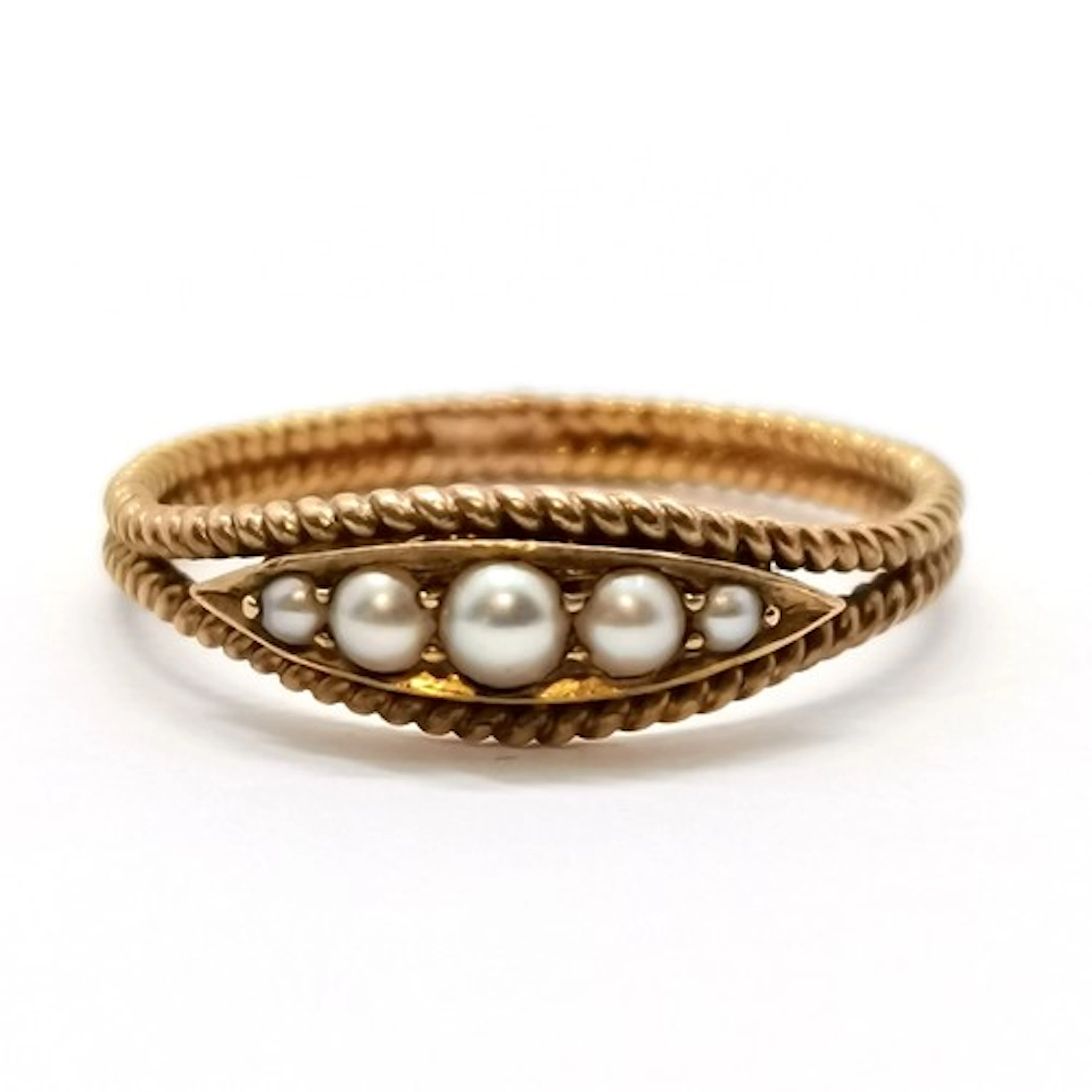 Antique (touch tests as 14ct) gold pearl set ring with doubl...