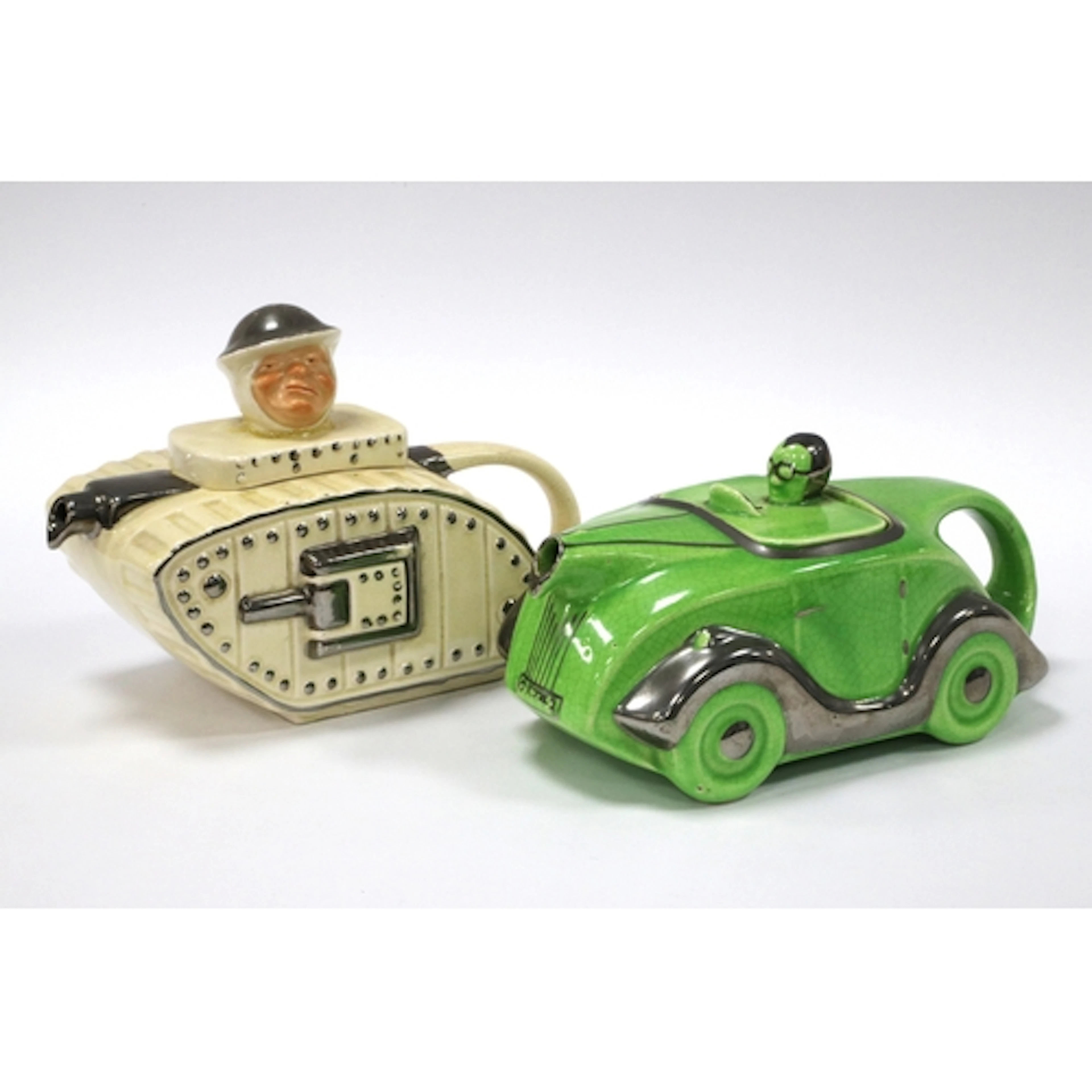 An Art Deco Teapot and Cover, in the form of a racing car an...