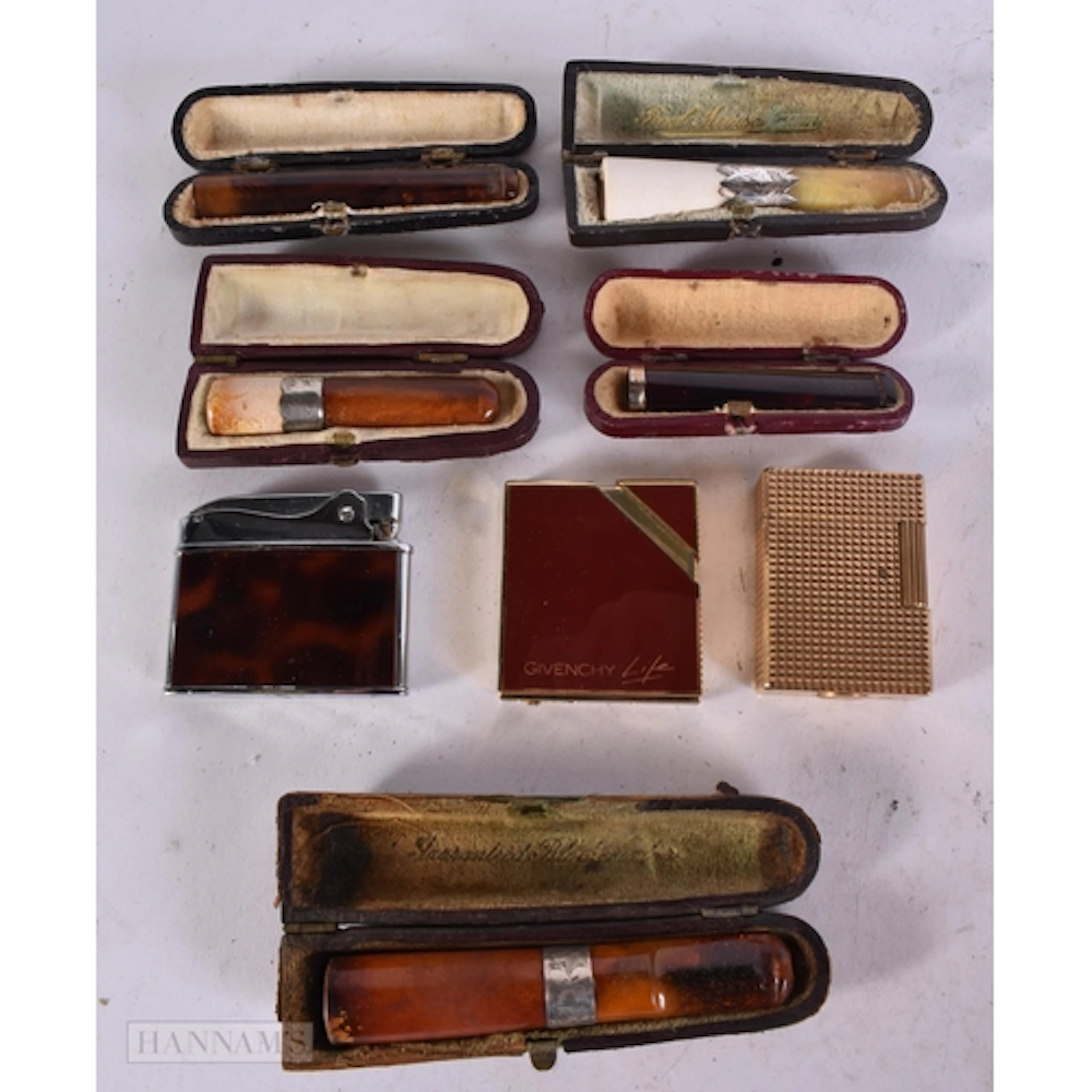 GIVENCHY, ROLEX AND ST DUPONT LIGHTERS together with cheroot...