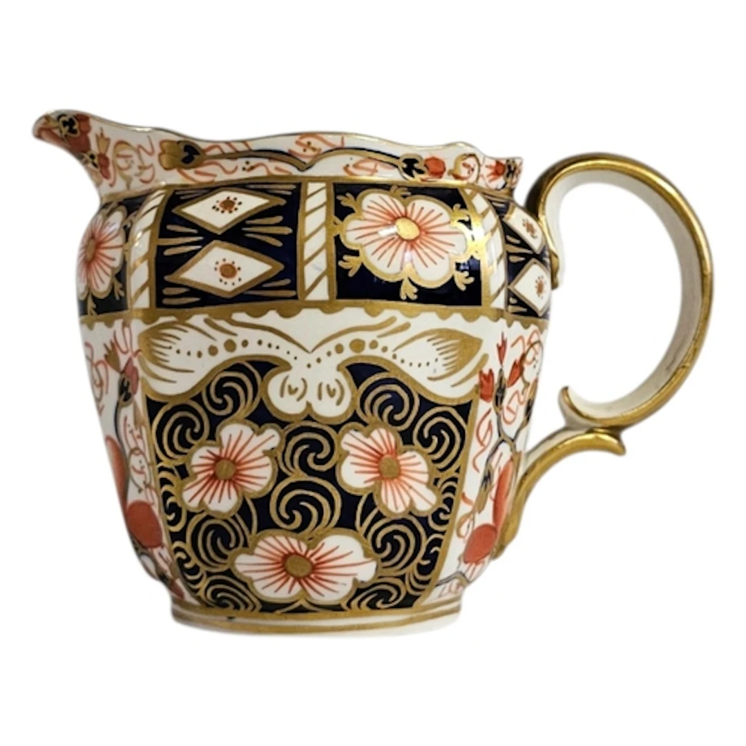 ROYAL CROWN DERBY, A 1920’S PORCELAIN CREAM JUG Imari palett...