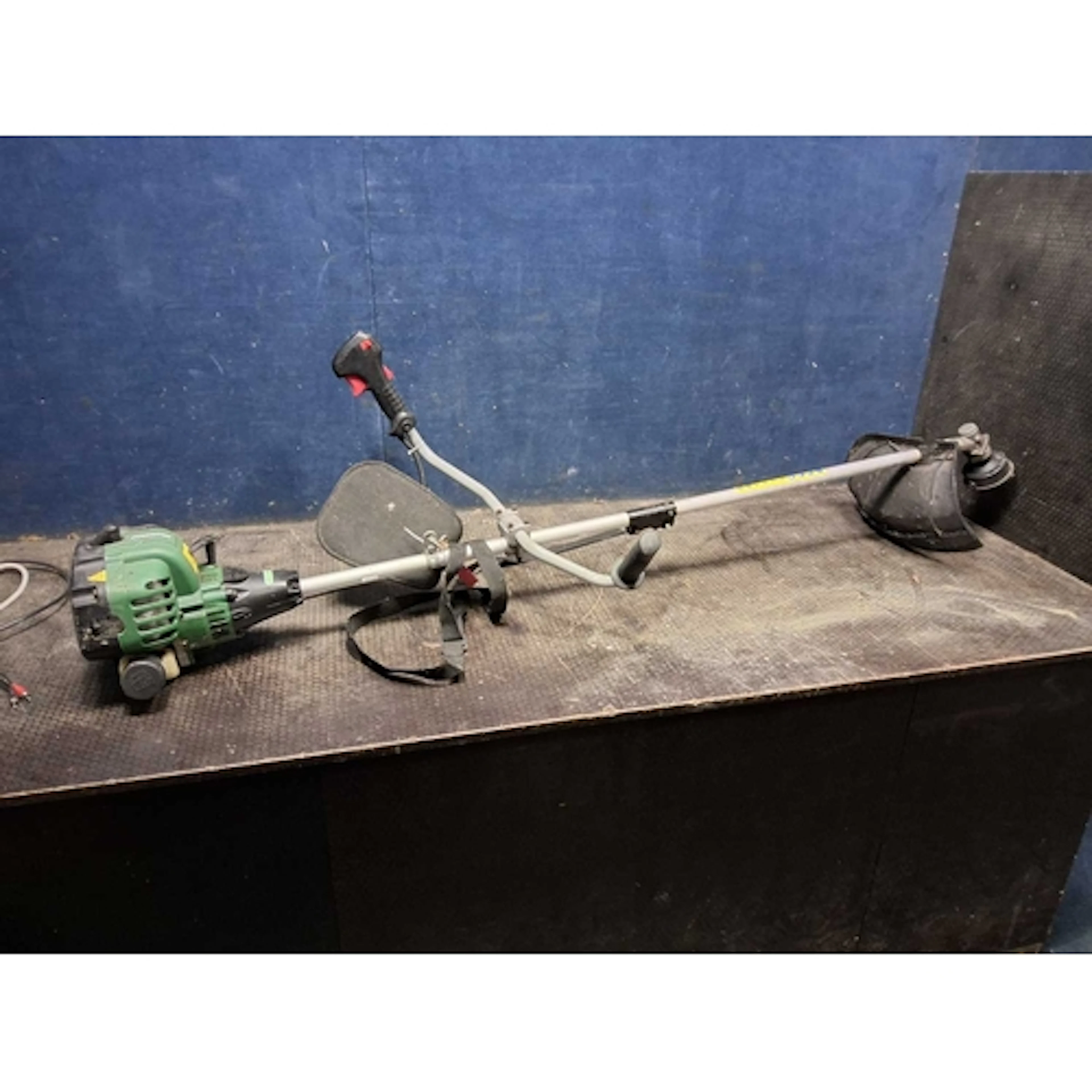 A QUALCAST GDB30B PETROL BRUSH CUTTER with strap (engine pul...