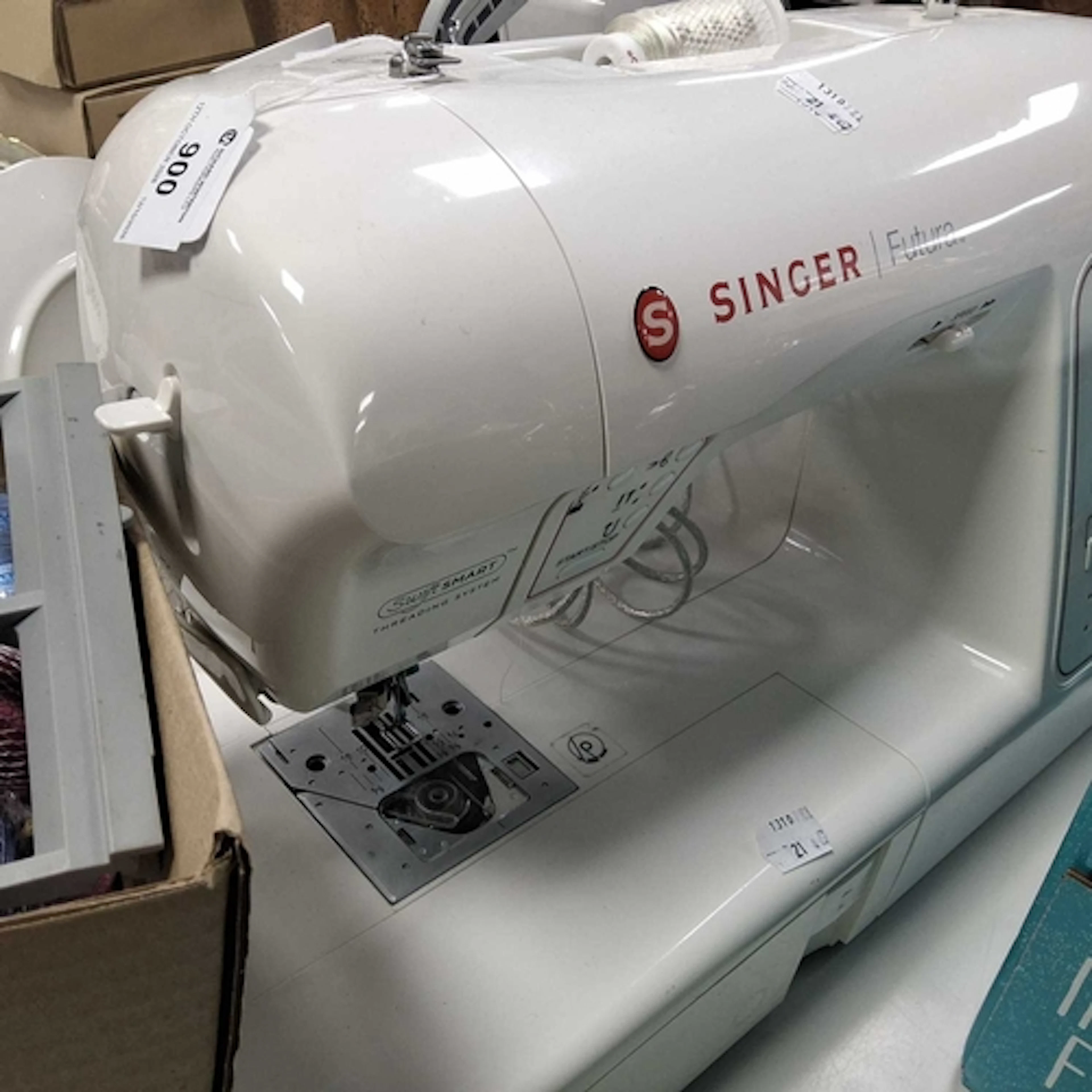 A SINGER FUTURA EMBROIDERY AND SEWING MACHINE, model XL580, ...
