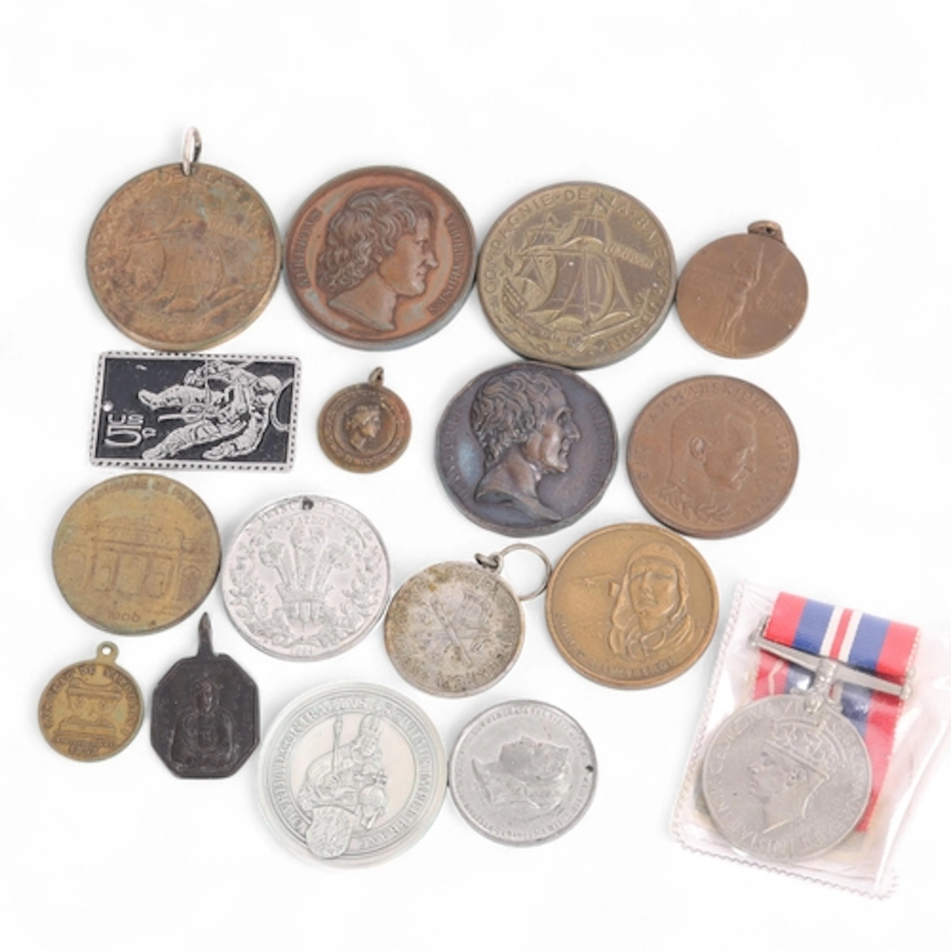A collection of commemorative coins and medals, including Hu...