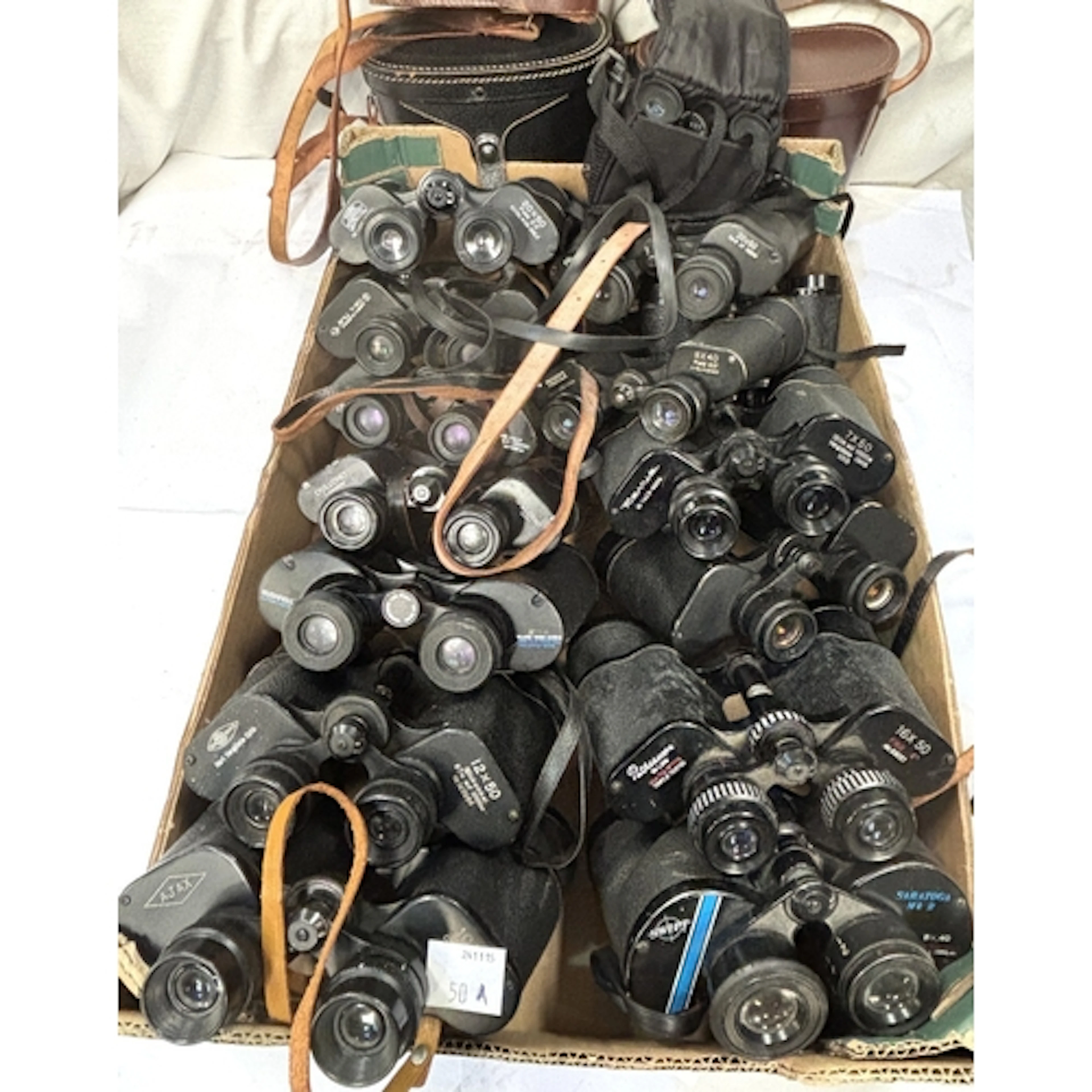 A large collection of vintage binoculars - Yashica, Dollond.