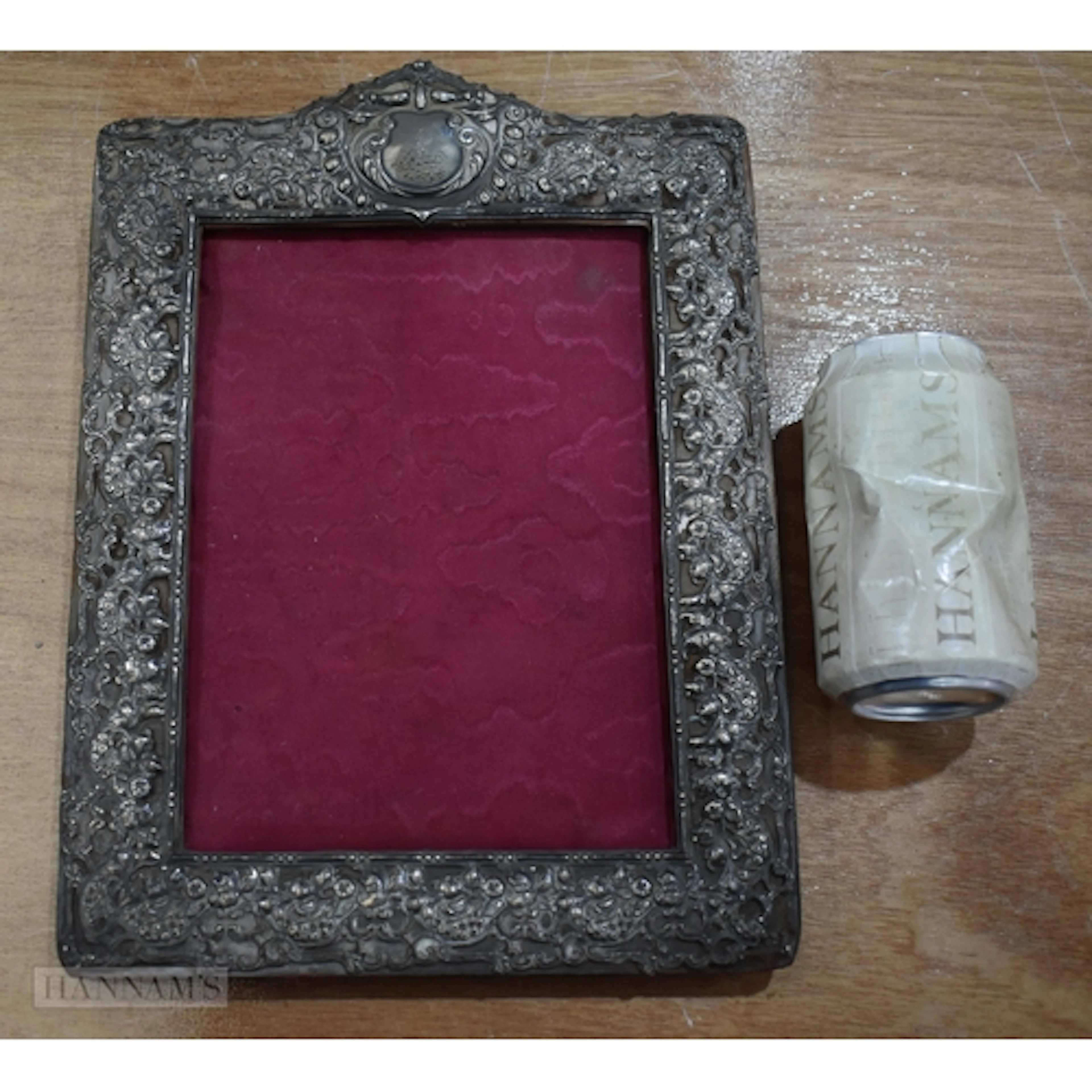 AN ANTIQUE SILVER PHOTOGRAPH FRAME. 30 cm x 23 cm.