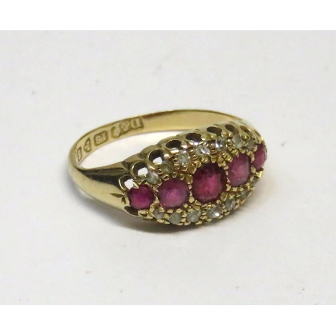 18ct Yellow gold ring set with rubies and diamonds, size I, ...