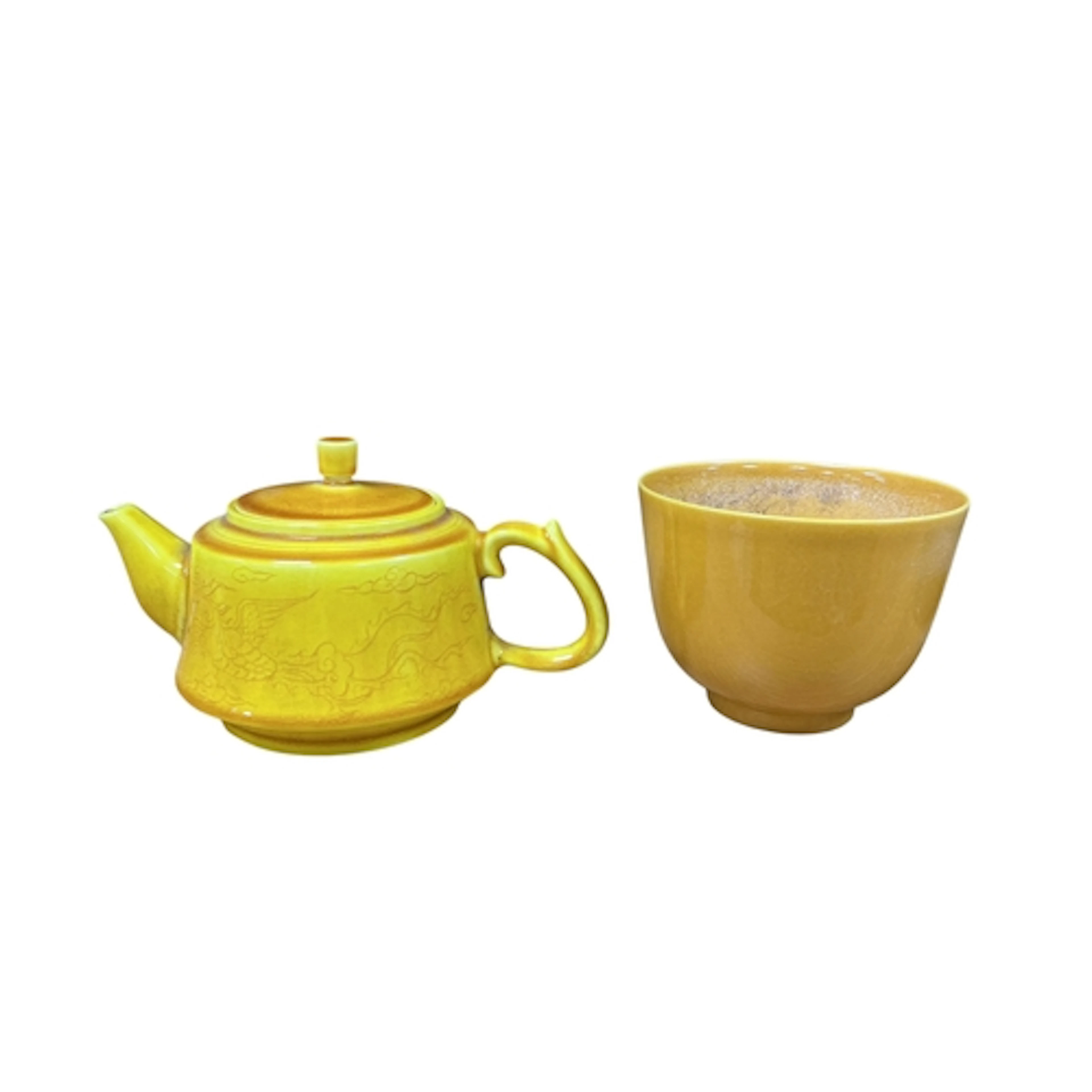 A Chinese yellow glazed cup, Guangru mark and a similar teap...